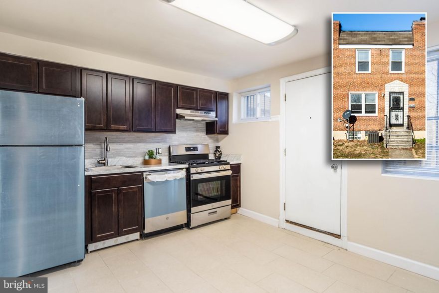 CHARMING MOVE-IN READY ROWHOME WITH 3 FINISHED LEVELS AND A FENCED YARD!  Features include wood floors throughout the main level, a spacious living room w/ chair rail, main level bedroom, upper level with 2 bedrooms and 1 newly renovated full bath, finished basement with a spacious eat-in kitchen with new  ss appliances, laundry room, and additional full bath, and a rear deck overlooking the fenced yard.   New Roof! Pack your bags and move right in!