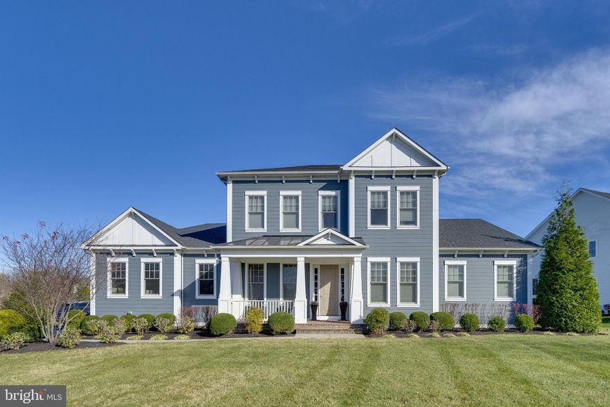 Welcome to your new perfect home!  Nestled in the highly desired Greens Village of Willowsford, this immaculate Camberley Home, Charlton Model, defines modern luxury.  A blend of contemporary design mixed with high-end details and finishes to create a comfortable and stylish space.  Some main features of this stunning home include a resort style pool and spa with pristine hardscape, an open floor plan with natural hardwood floors, a massive main level primary suite, a finished basement with full bar, and much more.

Upon entering this home, you will notice the meticulous design and attention to detail with the custom wood trim, crown molding, framing along the windows, doors, and entryways throughout.  The builder did not leave one stone unturned.   As you step into the wide foyer the personal home office will be to your right and an incredible dining room to your left that includes classic shadow bow accent walls, 9' crown molding, and upgraded modern light fixture.  The ten-foot-high ceilings on the main and upper level allows for the big windows to bring in tons of natural light throughout. 

As you make your way into the kitchen/family room area, you will notice the farmhouse style wood beams alongside the huge gourmet kitchen.  A chef's dream gourmet kitchen accompanied by floor to ceiling cabinetry, an expanded kitchen island, stainless steel appliances, granite counter tops, subway tile backsplash, deep farmhouse sink, updated pendant lighting, a spacious breakfast nook, butler's pantry with wine fridge and walk-in pantry closet.  Spend quality time with friends and family in the family room in front of the cozy fireplace or quiet time lounging in the sunroom that can be transitioned into a sitting area, dining area, or parlor.   

One of the best features of this extraordinary home is the massive main level primary suite!  The primary suite is secluded from the rest of the house by its private hallway leading into it.  The room extends from the back of the home all the way to the front.  Showered in a custom woodwork design, this quiet space provides amenities such as windows throughout, a large sitting room area, an enormous walk-in closet and a spa-like primary bathroom.   The primary bathroom offers dual vanities, an expanded shower with bench, large soaking tub, and private wash closet.  Other main level areas include a spacious mud room, laundry area, and three car garage.

Make special family memories in the outstanding outdoor oasis.  Surrounded by stunning landscaping and privacy trees that line this fenced-in space, the resort style pool and spa is the perfect place to enjoy those nice summer days.  While spending time at the pool, entertain guests with the outdoor kitchen featuring a stainless-steel grill and refrigerator or enjoy the fire around the built-in fire pit.    

Camberley homes are known for their wide hallways and stairways.  As you walk upstairs to the bedroom level you will see the open loft space that can be used as a den, kids play area, home theatre, or even an exercise area.  The three bedrooms include one with its own en-suite bathroom and the other two rooms share a jack and jill bath.

Be astonished by the size of the finished walk-out basement highlighted by the full wet bar with granite counters, KitchenAid refrigerator, and butler's sink.  The massive recreational area allows for multiple functional areas such as game area, exercise space, theatre room, craft space, and much more!

Willowsford offers some of the finest amenities including 2 resort style community pools, The Boat Lodge, The Sycamore House, miles and miles of hiking and biking trails, a splash pad park for the little ones, state of the art fitness center, an archery range, a zip-line playground, multiple dog parks, seasonal community sponsored events, and much more!  Don't miss this incredible opportunity.