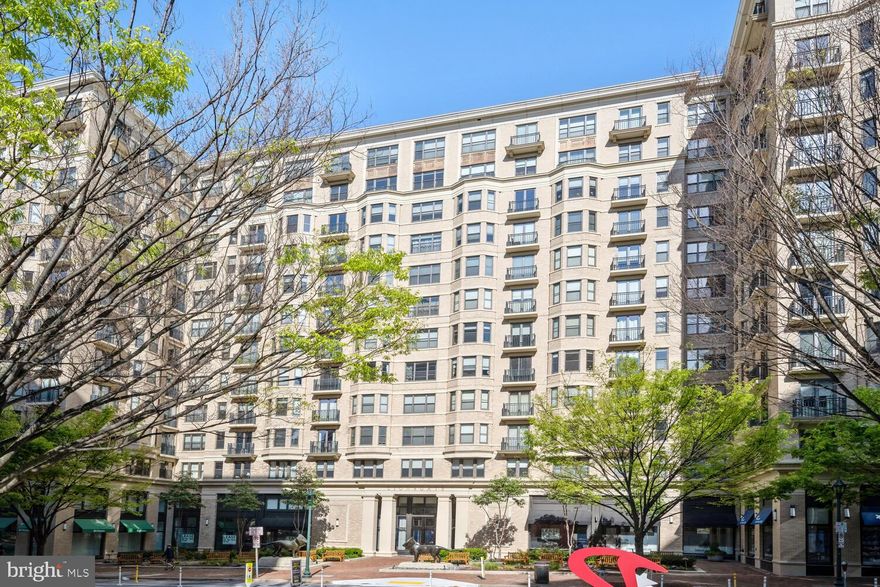 OPEN HOUSE CANCELLED! PROPERTY UNDER CONTRACT, BUT ACCEPTING BACKUP OFFERS. Indulge in the pinnacle of urban luxury living within the heart of Bethesda at the prestigious Lionsgate Condominium. Welcome to unit #913, where luxury meets convenience in a beautifully designed space boasting 1,773 square feet and a terrific floor plan.

Step through the inviting foyer into a haven of sophistication and light-filled ambiance. This two-bedroom plus den, two-bathroom sanctuary offers lovely finishes and thoughtful details at every turn.

The gourmet kitchen is the epitome of culinary craftsmanship, adorned with sleek quartz counters and light maple cabinets. A sprawling center island invites culinary creativity and serves as a gathering point for casual dining and entertaining. Equipped with top-of-the-line Viking appliances, including double ovens, hosting memorable soirées becomes effortlessly elegant. You’ll also love the butler’s pantry and ample space for a large dining table.

Relax in the expansive living room, suffused with natural light and offering breathtaking sunset vistas. A custom fireplace and mantel add a touch of warmth and elegance, while a Juliet balcony invites gentle breezes and panoramic views indoors.

Retreat to the private quarters along the bedroom corridor, where the primary suite awaits with its own balcony, custom walk-in closets, and an indulgent en-suite bath featuring a spacious shower and a separate soaking tub. A second bedroom and full bathroom provide comfort for guests, while the den offers a versatile space ideal for a home office or personal sanctuary.  You’ll also find a laundry room with full-size washer and dryer, and additional storage closets throughout the unit.

Offering a lifestyle of unparalleled comfort and sophistication, this full-service community provides so much to love including valet parking, friendly doormen, 24/7 concierge, a party room, a library, and a well-equipped fitness center.  There’s a spectacular rooftop terrace with grand views of the city, and amazing space for relaxing or entertaining with tables, lounge areas, barbeque grills, and more.  Unit #913 comes complete with two parking spaces, separately deeded, and an additional storage unit, too.  Located just two blocks from the Bethesda Metro, with easy access to Bethesda Row, the Capital Crescent Trail, and countless shopping, theater, and dining options, this is the perfect place to call home!