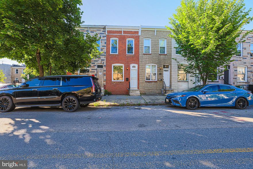 PRICE REDUCED!!! Beautifully renovated Baltimore City row home, with gorgeous hardwood floors throughout second floor, stainless steel appliances, granite counter tops, first floor laundry with washer and dryer and powder room, renovated upstairs bath, finished basement with full bathroom, fenced in rear yard.  Minutes away from the stadiums, restaurants, University of Maryland and the Harbor.  Definitely a must see.