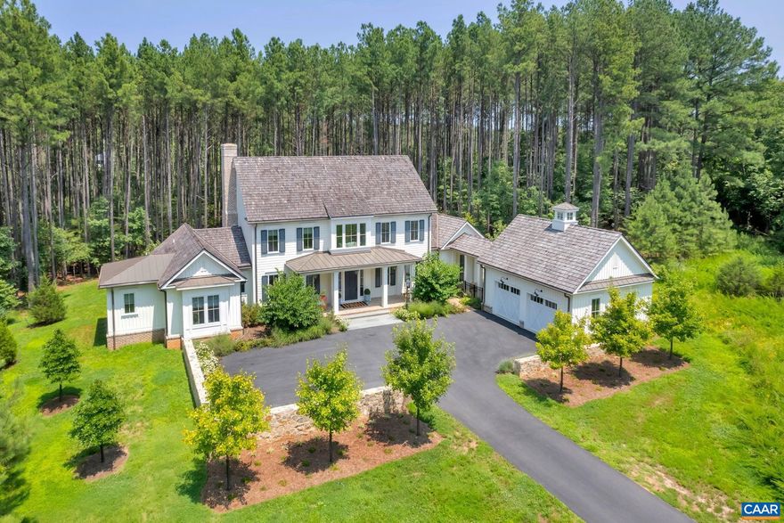 Luxury and Privacy in Keswick Estate // Custom home (C: 2021) with high quality craftsmanship, one level living and open concept is an absolute gem offering the perfect balance of traditional architecture and modern conveniences. You'll immediately notice the 10' ceilings and oodles of natural light. The home is located on a secluded lot with mature trees next to the Keswick Trails and a quick golf cart ride to the posh amenities of Keswick Club including "Full Cry" (Keswick's award winning golf course - #66 in Golf Week's Top 100), tennis, pool and Marigold restaurant.  Covered front and rear porches add to the charm and livability, plus the lush lawn is perfect for pets and play. Second floor offers a sitting area, Laundry room and 3 spacious BRs - all with baths en suite. Recent improvements include stunning light fixtures, custom paint & wallpaper, fenced backyard plus a snazzy beverage fridge with ice for mixing smoothies and cocktails. You'll appreciate the fine finish details, and delight in the hidden pantry, spacious closets, cozy vestibules, laundry on two floors, and expansive storage. First floor home Office doubles as a Peloton room - you decide if it should become a formal dining room or cozy lounge. Don't miss out!,Fireplace in Living Room