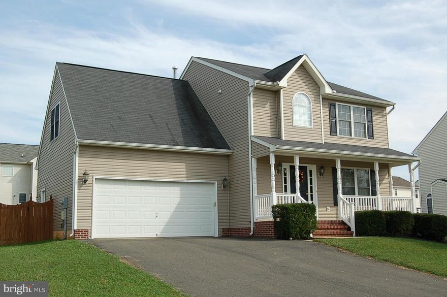 Friendly community with sidewalks leading to this beautiful home! This home offers 4 bedrooms, 2.5 baths, fresh paint and carpet.  2 car garage, unfinished basement (ready to be completed  for extra space), large deck and fenced back yard.  Close to I95, VRE and DT Fredericksburg.