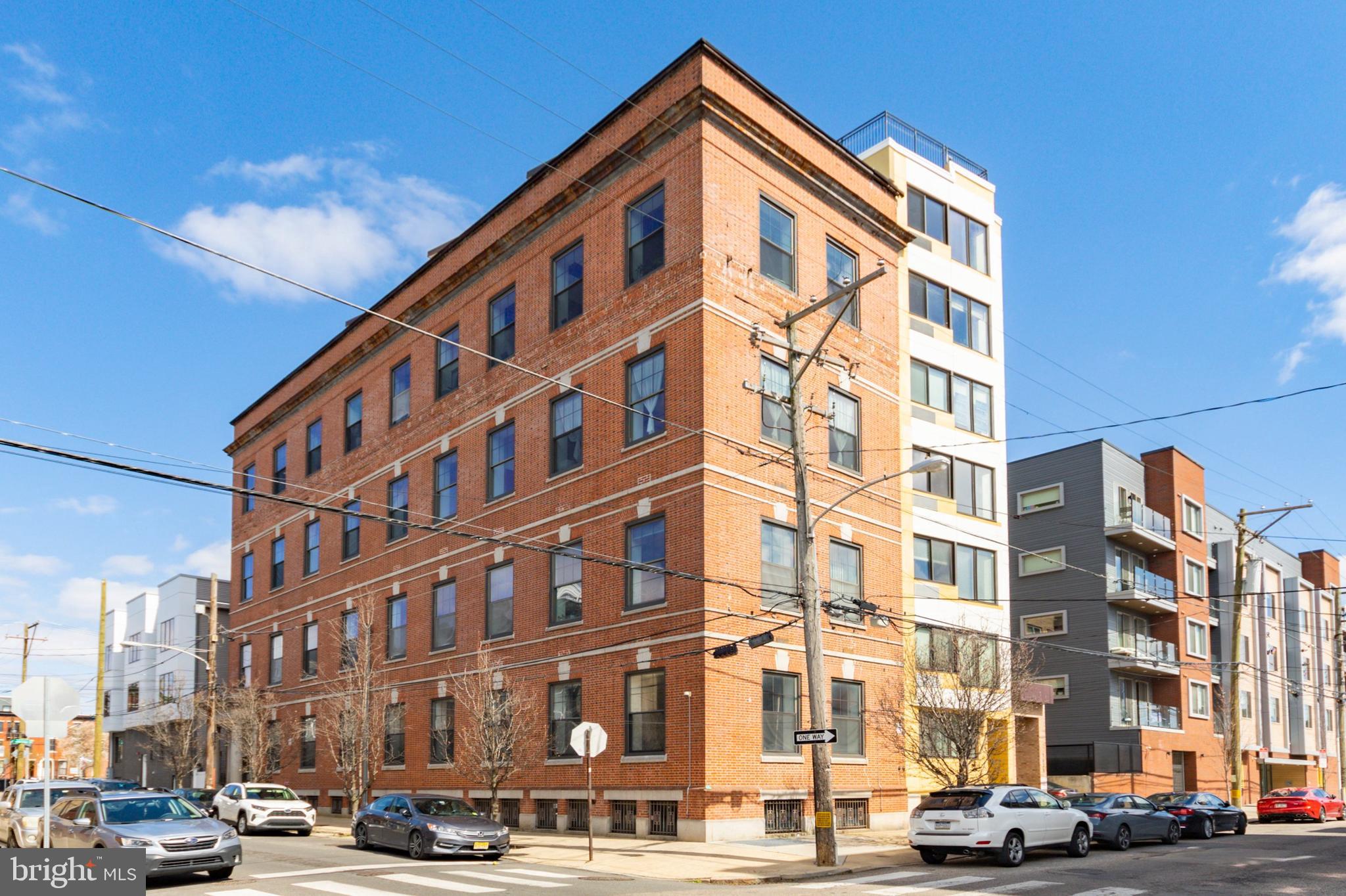 Available for June move in: History meets impeccable new construction in this beautifully designed building. Enter through the former Bell Telephone Exchange building, now with a fantastic new addition of new construction condominiums and known as The Exchange. The building combines industrial details with well thought out living spaces. This condominium is a spacious one bedroom, one bath, with its own in unit washer & dryer in HUGE walk in master closet. Modern kitchen with all stainless steel appliances including dishwasher, granite countertops. Light bamboo flooring throughout entire space, including the bedroom. AMAZING closet space. Great natural light from both northern and southern exposures. Common roof deck with outdoor furniture offers incredible skyline views! Great Francisville location offers walking distance access to public transit, with the Girard Broad Street line stop just a short 2 blocks away. Walk to all that the Fairmount and Art Museum Areas have to offer - wonderful shops and cafes, museums, and more. Pet friendly with deposit or fee based on type/weight, no breed or weight restrictions. Photos are of nearly identical unit in the building. Unit located on the 1st floor.