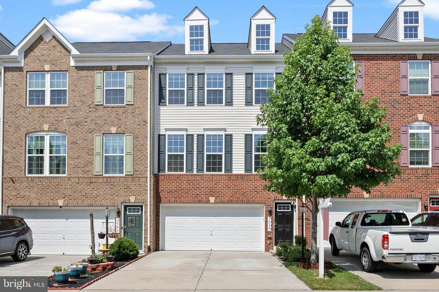 Welcome Home to this Stunning Townhouse at Featherstone Square!  3 finished levels with 3 bedrooms, 3 full bathrooms and a 2 car garage. This large townhouse features so many upgrades and a low monthly hoa fee as well.  The 9’ ceilings and beautiful hardwood floors on the main level.  The gourmet kitchen boasts a huge island with space for stools, tons of 42” cabinets, double door pantry, backsplash and stainless steel appliances.  Plenty of room for a large kitchen table too.  The maintenance free deck off the kitchen overlooks the community green space and has tons of built in privacy.  The living room area on the main level (along with the rest of the home) features large windows to bring in the natural light. Upper level offers 3 generous sized bedrooms, including the primary bedroom with a large walk-in closet.  The primary bathroom has a double sink vanity, large soaking tub and stand up shower.  There are two secondary bedrooms, a generously sized linen closet, a full hall bathroom and separate laundry room with hookups/space for a full size washer/dryer.  The lower Level has a huge rec/family room, a third full bathroom, access to the patio out back and the two car garage. There are multiple commuter options in the area, VRE, several car commuter lots within minutes (whether you drive or ride), commuter bus lot nearby, and easy access to HOT (High-Occupancy Toll) Lanes. So many retail and dining options to choose from as well.  Close by includes Potomac Mills, Costco, Wegmans and several additional grocery and shopping options… AND SO MUCH MORE!!!