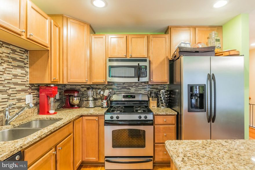 Super nice garage townhouse| condo in Melondy Landing in River Oaks Community. Everything you expect and more. Stainless appliances, granite counters, tile backsplash, deck, hardwood floors, two master suites upstairs, a bedroom and bath in the lower level or could make a great work at home office because of the full daylight sliding door wand easy access right from front door. Garage enters into the ground level foyer as well. Hurry not many homes for sale in this price range. Quick settlement is possible.