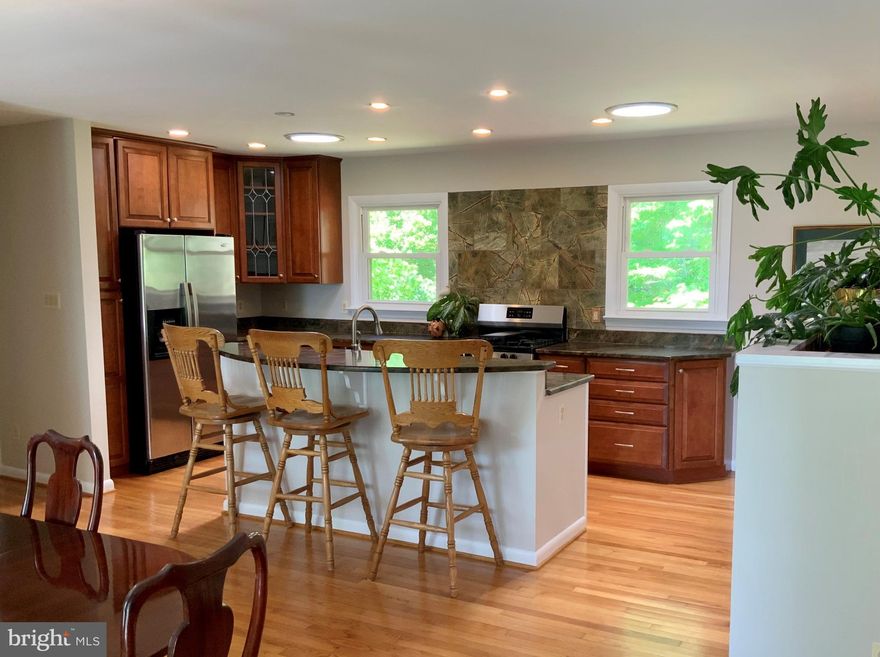 Beautiful stone rambler with basement in a serene country setting. Easy commute access. Enjoy the peaceful country drive home. Former home of a local stone mason featuring extensive stone work on the exterior and a stone hearth in the lower level.  Lime plaster walls in basement are breathable, antifungal and fire resistant.  Detached two car garage with unfinished space above (finish and can possibly rent as apartment).   Gorgeous Rainforest Green Marble counter tops in kitchen with new gas stove in 2020 and dishwasher in 2019.  Four solar tubes bring natural light into the kitchen and bathrooms.  New roof in May of 2019. Freshly painted with brand new carpets.  Home features Water Right Sanitizer plus water filtration system and a powerful WeBoost cell phone signal booster.    Enjoy your peaceful and tranquil new home. Huge deck perfect for family gatherings, only minutes from Warrenton. Professionally landscaped.