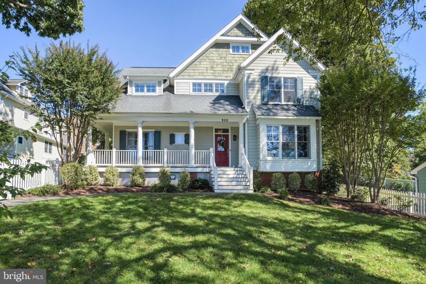 Located in the sought-after Woodside neighborhood near downtown Silver Spring, this 6BR/5.5BA has all the luxuries and charm that you've been looking for. Many aspects of the home have been custom designed, from the decorative wallpaper to the Hubbardton Forge light fixtures throughout. Main level features include a front living room, formal dining room, powder room, home office with 2 walls of built-in shelving and cabinets below, mud room with side-by-side- washer and dryer, large gourmet kitchen with quartz counters, center island with seating, Viking refrigerator, Viking gas range and hood, and Viking double wall ovens. Adjacent to the kitchen is a large breakfast area with windows overlooking the backyard, as well as a large family room with wall of built-in shelving with cabinets below and double doors out to rear flagstone patio and deck. The second level of the home offers 4 Bedrooms and 3 Full Baths - Including the primary bedroom with tray ceiling, reading lights on either side of the bed, 2 separate walk-in closets, and attached primary bath with double vanity, soaking tub and separate glass door shower. The top floor has a loft area great for an additional home office or yoga studio, a large bedroom, and a full bathroom. The finished lower level offers extensive storage space, including a large storage room with at-home dog washing station! You'll also love the roughly 2,500 bottle wine cellar, the home theater space with 110" screen, projector, and 8 surround speakers. The 6th bedroom and 5th full bath is great for guests or ideal for an au pair or in-law with added kitchenette with sink and full-size refrigerator. Additional home features include Brazilian cherry flooring, 9' ceilings, oversized windows, top of the line Bryant dual zone heating/cooling, hardwired/monitored smoke and alarm systems, gigabit ethernet available (hardwire LAN cable currently exists to top floor), automated lighting and door locks, wraparound porch, a detached 2-car garage and a fully fenced front and rear yard. The location is prime - walkable to Metro, downtown Silver Spring and easy commute to DC.  Please note: Square footage is estimated and calculated by an independent third party; information is deemed accurate but not guaranteed.