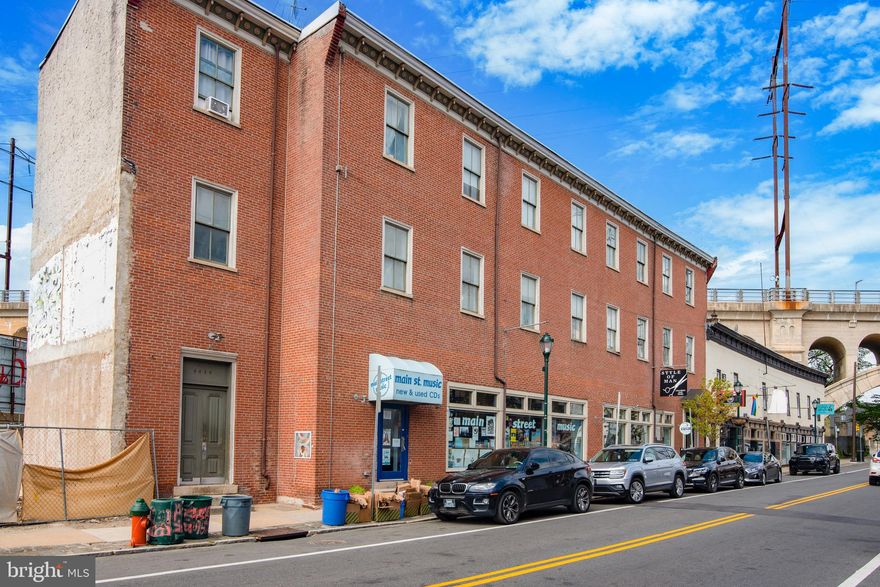 4444-48 Main St is located along Manayunk’s main commercial corridor. This property boasts 96’ of frontage on Main Street. The two commercial tenants are Main Street Music, who has been there since 1996, and Style of Man, which opened in 1995. Together, they occupy the ground floor of the building. There are five residential apartments above, all of which are bi-level 2BD/1BA units. The apartments have W/D in unit, gas forced hot air and central A/C. The music store has been kept at the building in a sweetheart arrangement because the Seller owns many buildings on Main St and feels the music tenant is an asset to the block. The property has been self managed by Ownership who has kept residential rents below market to avoid turnover.
