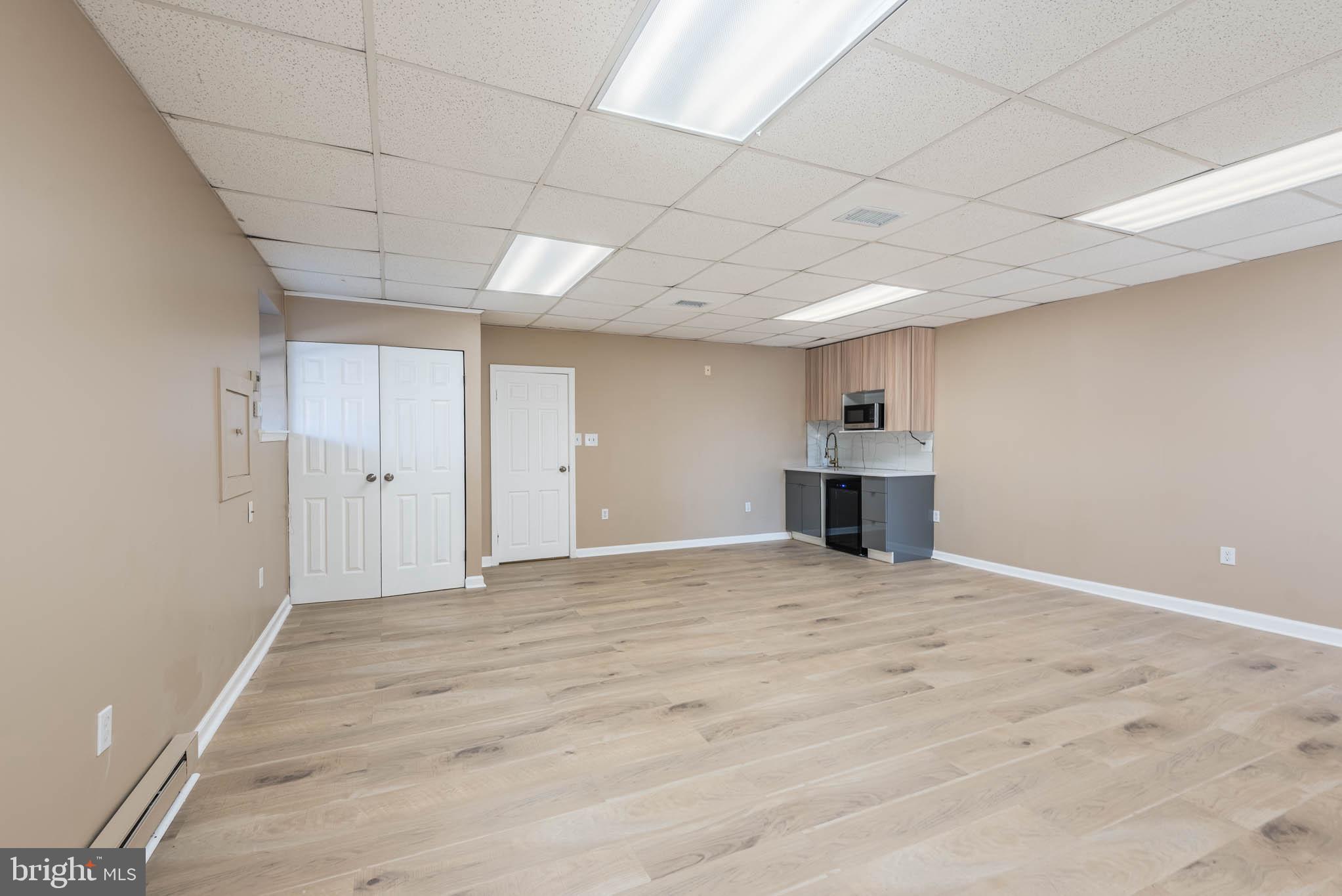 Newly updated 2nd level commercial space in a large commercial property with direct exterior access. This space features a front office area and a separate larger area with a kitchenette and bathroom. Direct access from the side parking lot with ample parking. Located in a highly visible location with easy access to 695 & 95.