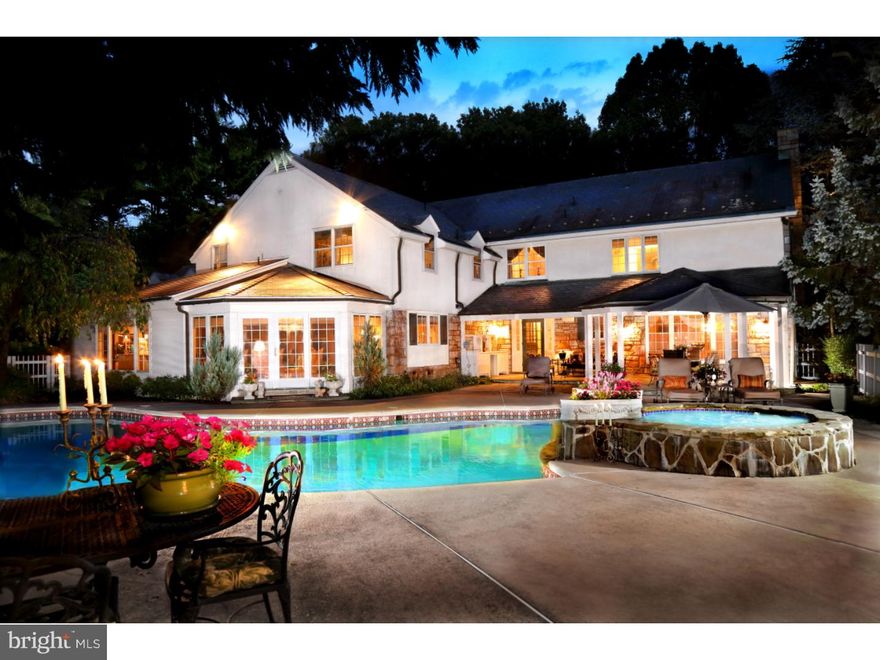 Rare Opportunity to own one of Wyomissing's Premier Properties.  This Magnificent stone home with  4-car garage sits on 1.34 manicured acres in the heart of Wyomissing's beautiful Birdland community.  A rare gem that does not come on the market often.  This home is for the most discriminating buyer who is looking for the finest in craftsmanship, attention to detail, privacy and luxury.  Once you step into this incredible home, you will immediately notice the attention to detail in the woodwork, architectural features & design.  To the left of the elegant main foyer, you enter the homes grand sunken living room which expands the depth of the home and boasts an exquisite marble gas fireplace, antique crystal chandelier, separate custom wet bar, fine crown moldings with architectural details and large bay windows which overlook the back yard.  As you look through to the covered stone patio, you see beyond to the heated pool, hot tub and separate pergola sitting area with a gas fireplace.  There is also a large sports court to the right of the pool/patio area and an addit. lot to the left with manicured lawn & gardens which create your own private outdoor oasis. To the right of the foyer entrance is a fabulous formal dining room with European hand-painted wall paper, crystal chandelier, crystal wall sconces and hard wood flooring.  It is plain to see the owners spared no expense in renovating this home.  The gourmet kitchen has fine custom cabinetry, granite counter tops, a huge center island w/seating, walk-in 6ftX12ft pantry, professional appliances, double oven, vaulted separated dining/eating area with grand pillars, all opening to the great/family room and out onto the private pool/patio areas.  This area is light and bright and the heart of the home.  The magnificent master-suite has been renovated to include a sitting area w/wood burning fireplace, and on-suite master bathroom w/custom cabinetry, double sinks, separate steam shower, Jacuzzi tub and separate walk-in dressing room closets.  There is a separate guest/in-law suite with at the opposite end of the second floor as well as 4 additional bedrooms, 2 additional full bathrooms, upstairs laundry room and second staircase.  The lower level has its own gym, billiard/theatre room w/fireplace, ping pong game room, half bath and custom wet-bar lounge area.  Don't miss the opportunity to own this Premier Stone home in the Wyomissing Area School district voted #1 Best Public School by Princeton Review.