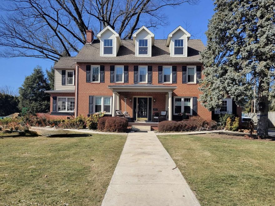 Nestled on the corner of prestigious Park Place and Molly Pitcher Highway, this exquisite Victorian manor exudes timeless elegance and modern comfort. Built in 1940, this stunning residence has been thoughtfully maintained, showcasing the charm of its architectural heritage while offering the conveniences of contemporary living. As you approach the property, the classic brick façade invites you into a world of sophistication. The expansive 0.55-acre lot provides ample space for outdoor enjoyment, and the Memorial Park in the back yard offers basketball, baseball, walking paths, and more. Step inside to discover a warm and inviting interior that seamlessly blends traditional details with modern amenities. The heart of the home features a cozy gas fireplace, perfect for gathering with loved ones on chilly evenings. With six spacious bedrooms and five large bathrooms, this residence offers an abundance of space for both privacy and togetherness. The partially finished basement, complete with an outside entrance and full bath, presents endless possibilities-whether you envision a home business, a home gym, a media room, or additional guest accommodations. The heated space ensures year-round comfort, making it a versatile area for your lifestyle needs. The common laundry area adds convenience to your daily routine, allowing you to focus on what truly matters-creating memories in your new home. This property is not just a home; it's a lifestyle. Enjoy the tranquility of suburban living while being just moments away from vibrant local amenities, fine dining, and boutique shopping. The Park Place community offers a sense of exclusivity and connection, making it the perfect place to call home. Experience the perfect blend of luxury, comfort, and timeless charm in this remarkable Victorian manor. Your dream home awaits, ready to embrace you with open arms and endless possibilities. Zoned transitional commercial and currently a licensed vehicle dealership.  Once in a lifetime opportunity to make your home and business the highlight to the entrance of Shippensburg.