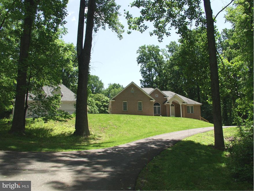 NEXT to BRAMBLETON!  Two Separate Living Spaces on the Same Property.   Main House - Custom Home 2 levels, 4 BR, 3 BA, Gorgeous Architectural Features, Built ins, Upgrades Thru out.  2nd home 5th BR 4th BA 7 car gars w/ at grade dream workshop, COMPLETE in law suite on Upper Lvl * PERFECT In Law Apartment, Separate Business, or Guest House ** PRIVATE Setting on 4.4 Acres But CLOSE IN!