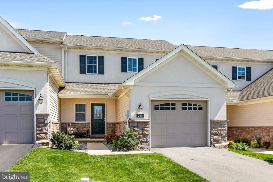 This move-in ready townhome offers one floor living with a first floor primary bedroom and bath with walk-in closet, and first floor laundry.  The spacious second floor includes two large bedrooms, a loft area and a second full bathroom.  You'll love the open first floor layout with kitchen open to dining and living room, includes granite counters, ample cabinets and a large island.  Convenient 1 car garage and sliding door to outdoor patio.  Includes all appliances, large unfinished basement.  Easy living with snow removal and lawn care included.  Come see this beautiful home for yourself!