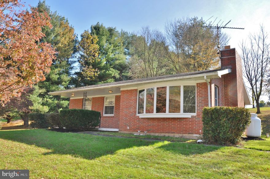 Amazing location, brick rancher with three bedrooms, two full baths, finished lower level, and a detached garage!  Located in the zone sits this wonderful home with so much to offer.  From the two fireplaces, to the amazing view out the front windows,  this house just feels like home.
Central air, newer boiler, high speed internet, and a whole house generator!   Needs some updating but you could not ask for a better foundation to start.  Wood floors under carpets on main floor.  Properties like this are few and far between.  Enjoy your coffee on the cozy front porch, or appreciate your privacy out in back yard.  Nice oversized detached garage with epoxy floor and new garage door opener.  Home sits on over an acre with beautiful views!
All appliances convey and a one year home warranty too!  Enjoy the holidays in your new home in the country.
Check out all the pictures and then call with questions or to set up your private showing.