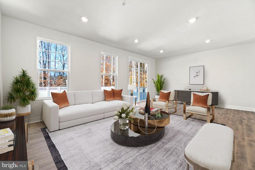 This Bradbury interior townhome offers an inviting walk-out basement with ample backyard space and fencing included within Marlboro Ridge. This community offers an amenity rich program with a club house, pool, tennis courts, tot lots, equestrian center, equestrian trails, and walking trails. It features 4 bedrooms and 2 full baths, along with 1 half bath for added convenience. The heart of this home is the gourmet kitchen, featuring grey cabinets, modern appliances, and ample counter space and an island for cooking and entertaining. Cozy up in front of the electric fireplace in your family area, creating a warm and inviting ambiance. Relax and take in the natural beauty of the outdoors from your front balcony as you face a tranquil tree line. The finished lower level provides a wonderful gathering space for family and friends. This townhome is set for closing in December and will provide a comfortable and stylish living experience for the upcoming season.