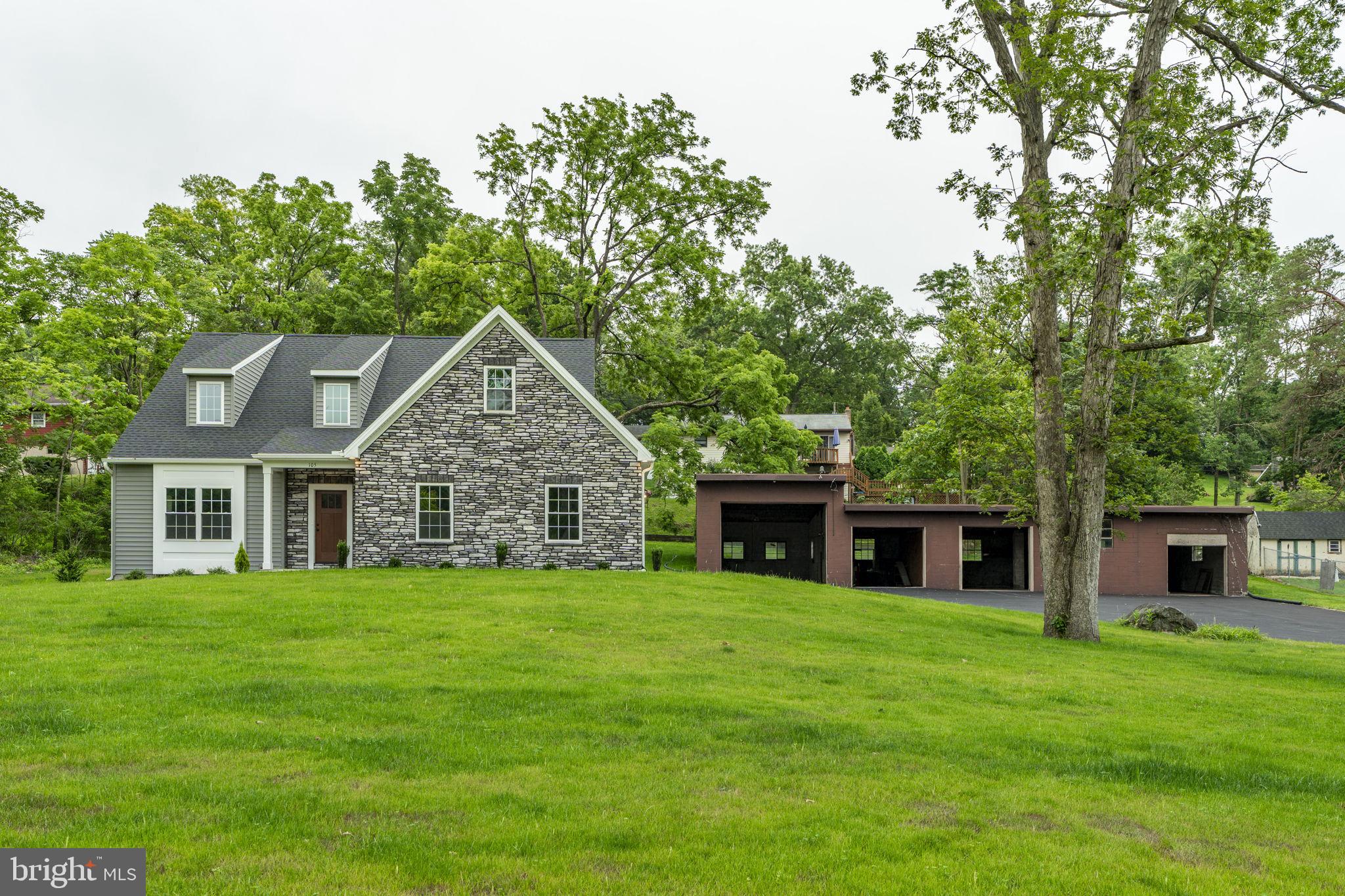 Spectacular New Construction on Nearly an Acre in Elizabethtown! This exceptional 2,217 SF home by Burkholder Builders is completed, move-in ready, and perfectly situated on the outskirts of Elizabethtown. Enjoy the privacy of a 0.90-acre lot while being only minutes from town, with quick access to Route 283, Route 743, and a short drive to Hershey, Harrisburg, and Lancaster. The thoughtfully designed floor plan features an open-concept first floor with a bright living, dining, and kitchen area centered around a stunning gas fireplace. The modern kitchen is equipped with a central island and stainless steel appliances-ideal for both everyday living and entertaining. The first-floor primary suite includes a walk-in closet and a luxurious en suite bath. A laundry room and convenient powder room complete the main level. Upstairs, you'll find two generously sized bedrooms, a second full bathroom, and additional storage space. The full, unfinished basement is ready for future finishing or storage. Car enthusiasts and hobbyists will love the oversized detached 42x20 garage with four bays (one oversized and three standard), in addition to the attached 2-car garage. Outdoor living is just as inviting with a stamped concrete patio and a charming front porch overlooking the expansive yard. Don't miss this rare opportunity to own a brand-new home with space, privacy, and premium features in a sought-after location!