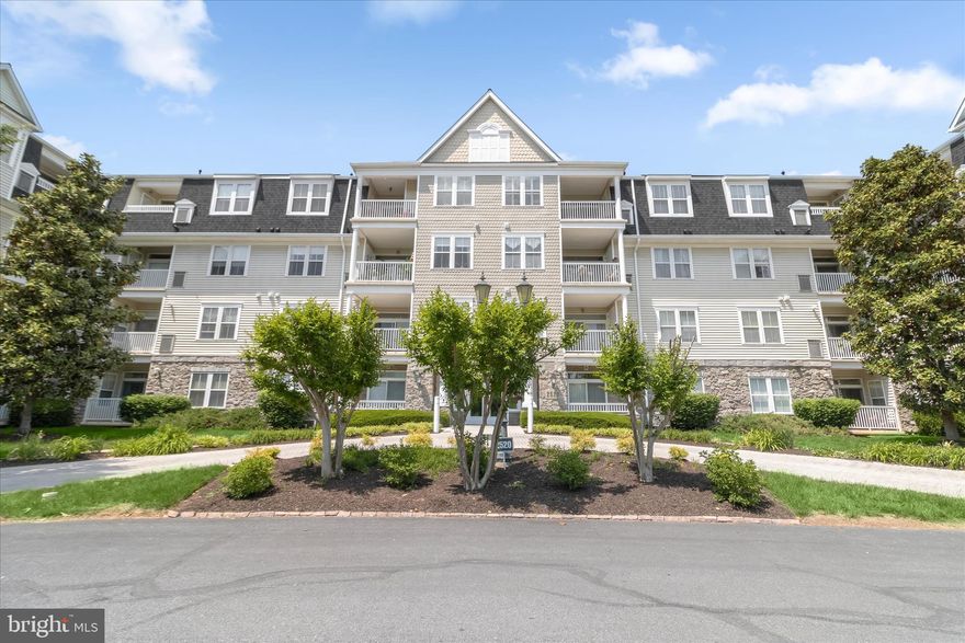 Welcome to easy living in the highly sought-after Worman’s Mill community in Frederick. This beautifully maintained first-floor condo at 2520 Waterside Drive #112 offers the perfect blend of comfort, style, and convenience with a premium wooded backdrop and private balcony overlooking the trees. Inside, the spacious living room features luxury vinyl plank flooring, elegant tray ceilings, a cozy fireplace, and direct access to the balcony, creating a warm and inviting atmosphere. The eat-in kitchen is thoughtfully designed with ample cabinetry, sleek appliances, center island, and adjoining dining area ideal for everyday living and entertaining. The spacious primary suite offers two walk-in closets and a private en-suite full bath, while the second bedroom also includes a walk-in closet and easy access to the second full bath. A convenient laundry area completes this wonderful home. Best of all, this is not a senior living or age-restricted community, making it an excellent option for a variety of lifestyles.
Residents of Worman’s Mill enjoy a vibrant community atmosphere with beautifully landscaped streets, trails, pocket parks, gathering spaces, and outdoor concerts throughout the year. Just steps away, The Village at Worman’s Mill offers convenient dining and entertainment with local favorites including Ricci Italian Restaurant, Plaza Mexico, and ANDAZ Fine Indian Cuisine. Minutes away, Historic Downtown Frederick offers Carroll Creek, boutique shopping, breweries, restaurants, and year-round events. Nearby shopping destinations include Clemson Corner, The Shops at Monocacy, and Westview Promenade, while outdoor enthusiasts will appreciate close proximity to the Monocacy River and Riverside Park trails. Commuters enjoy quick access to Route 15, I-70, and I-270, making travel to surrounding areas simple and convenient. Experience low-maintenance living in a community that truly offers location, lifestyle, and everyday convenience.