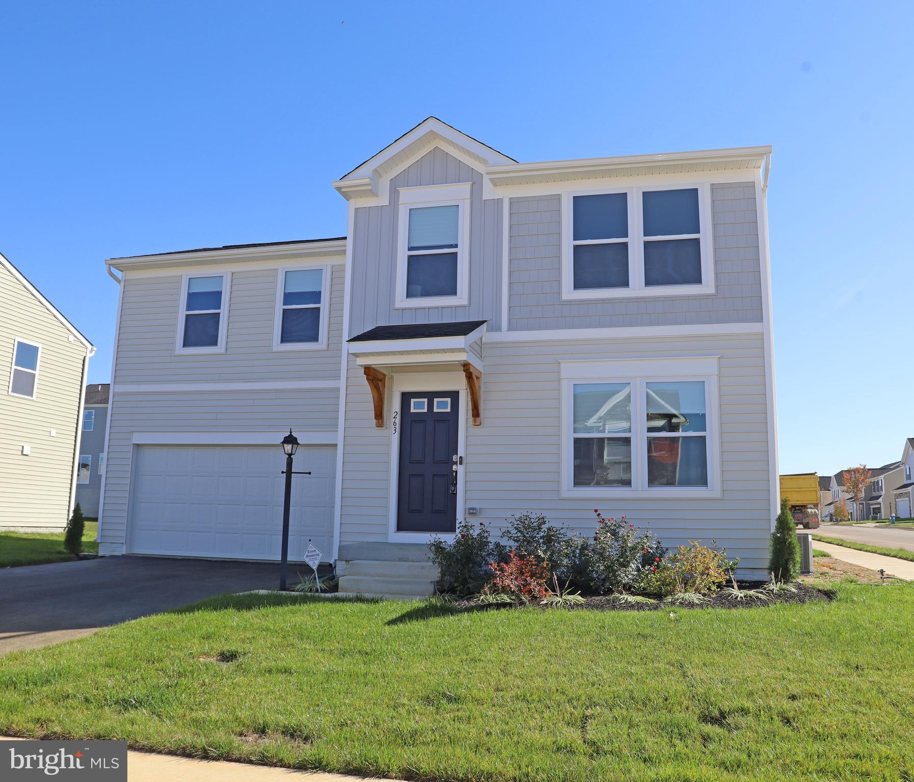 Welcome to this newly built 4-bedroom, 2.5-bathroom colonial in the sought-after Huntwell West community! Situated on a premium corner lot, this home features an inviting open floor plan, perfect for modern living. The spacious family room flows seamlessly from the kitchen, which boasts granite countertops and a large island, ideal for entertaining. Enjoy the convenience of an upgraded lighting package with LED recessed lights throughout the home. The second-floor laundry room adds to the functionality, while the large primary bedroom offers a private en-suite bath for a peaceful retreat.
This home also includes a full unfinished basement with walkout steps and a bathroom rough-in, giving you endless potential for customization. With a two-car garage and proximity to shopping, schools, and commuter routes, this property provides the perfect balance of convenience and comfort.