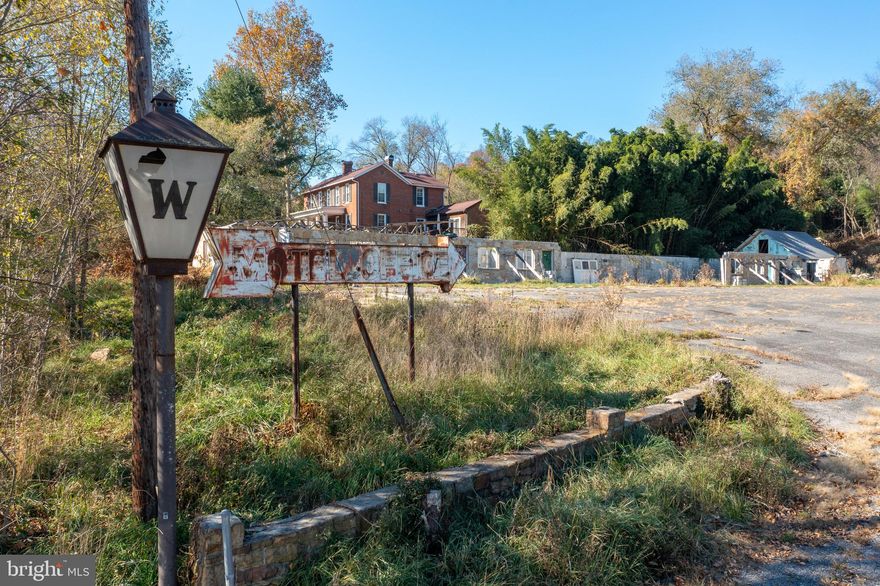 Please see all photos of property and structure that exists. - Looking for the perfect place to build a home?  Look no further!  Offering just over 1 acre, this land is conveniently located close to Sheetz on Naves Cross Rd. Public water hook up available. Bring in the bulldozer, clear it out a bit, and start building!