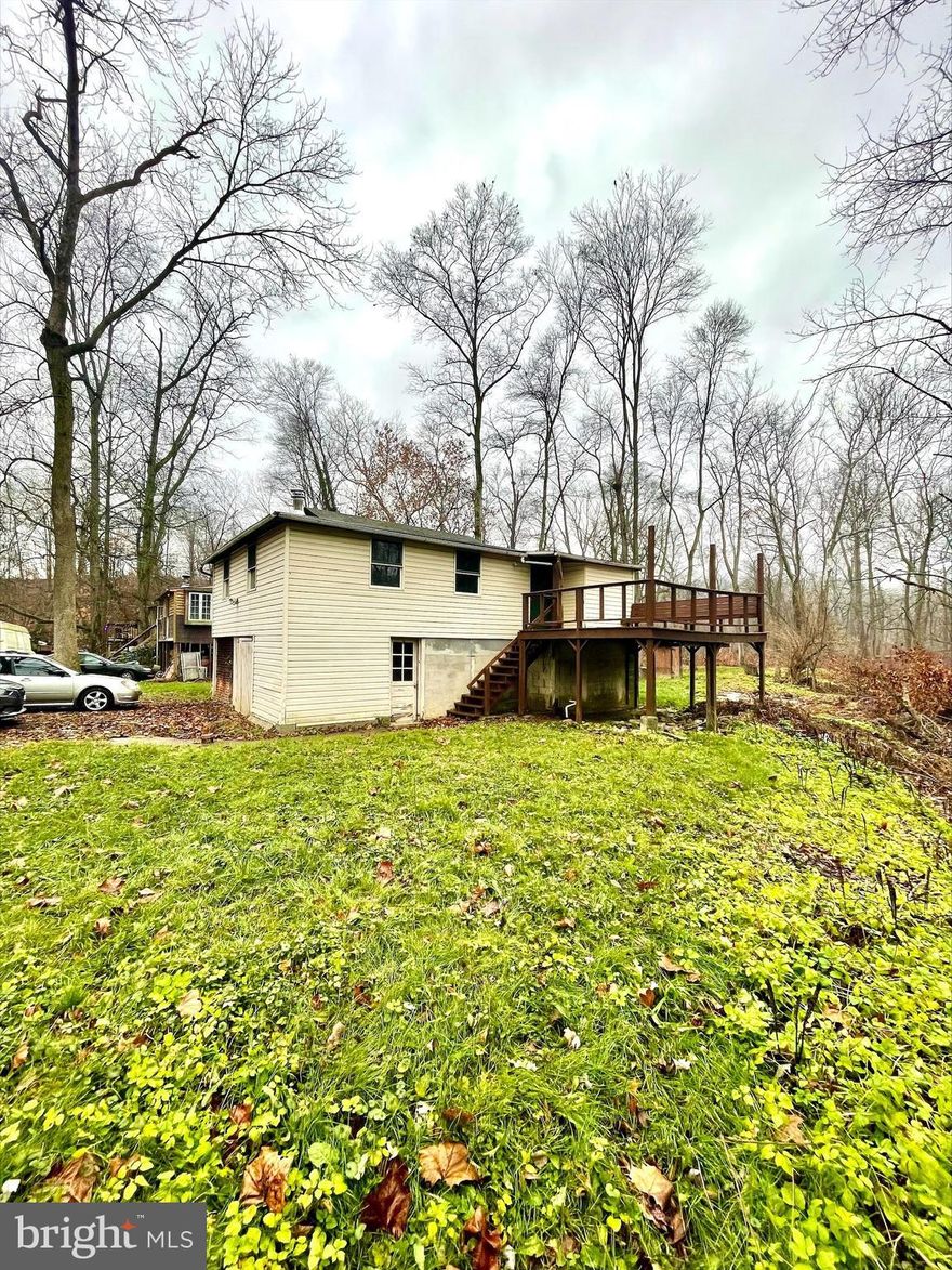 Calling all investors or outdoor lovers! This 2 bedroom bungalow in Fleetwood Area school district situated on a large lot right on Maiden Creek! This would make a fantastic rental property, weekend getaway or a great home for someone who really enjoys all that nature has to offer. Surrounded by trees on a private lane. The interior has been well-maintained and updated over the years. There are hardwood floors throughout this cozy home. Updated electrical, kitchen, and bathroom. Relax by the wood burning stove in the living room or hang out on the deck over looking the creek.