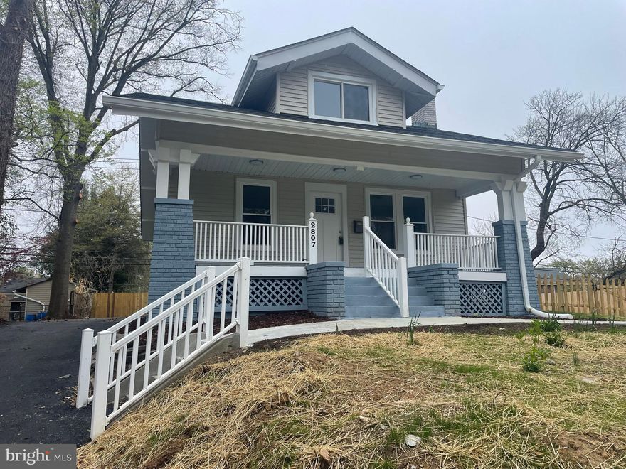 Double lots (2 tax ID) with almost 0.3 acre.  A truly impressive residence offering an expansive main level designed for both everyday living and elegant entertaining. The spacious living room is flooded with natural light and showcases sweeping, elevated views. The dining area flows seamlessly into a beautifully updated, open-concept kitchen featuring quartz countertops, crisp white cabinetry, stainless steel appliances, dual wall ovens, a pantry, and generous breakfast bar seating. Just beyond, the oversized family room is a standout space with a custom dry bar, walls of natural light, and direct access to an enormous deck—an exceptional setting for gatherings both large and small.

The main level is completed by a well-appointed bedroom and full bath, ideal for guests, extended stays, or multigenerational living. Upstairs, the primary suite offers a tranquil retreat overlooking the rear yard, complete with two closets and a private spa-inspired bath featuring two striking showers. Three additional bedrooms and a fully renovated hall bath complete the upper level.

The fully finished lower level provides exceptional flexibility with open space perfect for a den, game room, home office, or fitness area, along with a dedicated laundry area.  New roof, new HVAC, etc.

Set on a generous 0.3-acre lot, the property features a large driveway, rear parking pad, and ample off-street parking for multiple vehicles. The fully fenced rear yard offers both privacy and space to enjoy. Ideally situated on a quiet street in the charming town of Cheverly, this home combines a peaceful residential setting with close proximity to shopping, dining, and major commuter routes.