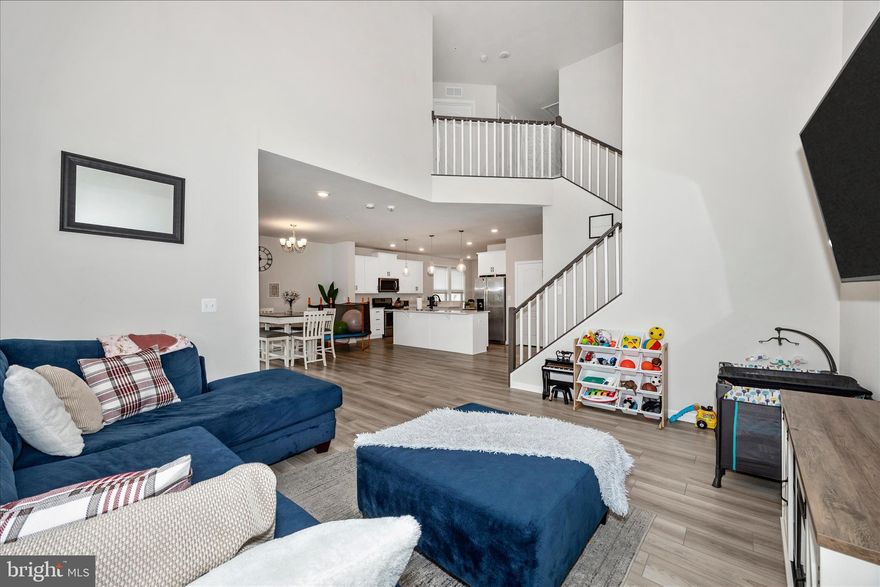 Rare opportunity to secure a below-market interest rate and lower monthly payment with an assumable loan!

Welcome to 1701 Evansberry Drive, a beautifully maintained, former model home in the desirable Canterbury Station community. Qualified buyers have the unique opportunity to assume the seller's existing mortgage, offering potential savings compared to today's higher rates.

This nearly-new 3 bedroom, 2.5 bath home features over 2,400 square feet of modern, with open-concept living space designed for comfort and entertaining. The main level showcases a dramatic two-story foyer that immediately sets the tone for the elegance and openness throughout. The main level is bright and spacious, with a stunning kitchen, large center island, and  seamless flow into the living and dining areas. The home also boasts a custom rear deck; built in 2022!

Upstairs, retreat to a spacious owner’s suite complete with a walk-in closet and private bath, along with generously sized secondary bedrooms and the convenience of bedroom-level laundry.

The unfinished basement with a full bathroom rough-in offers incredible flexibility: create a guest suite, additional bedroom, home gym, or custom entertainment space tailored to your needs.

Located in the sought-after Canterbury Station, a boutique-style community just minutes from downtown Frederick, you’ll love the convenience of nearby shopping, dining, and local favorites like coffee shops, breweries, and more; all within easy reach.

Model home quality. Modern design. Prime location. Endless potential.

Motivated Seller!