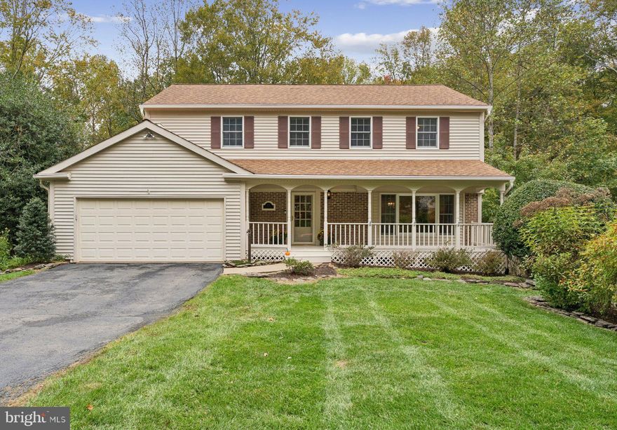 Welcome to 9211 Beachway Lane in sought-after Lakewood Hills, a nature lover’s dream & commuter’s delight! Just a 5-minute walk to Huntsman Lake trails and under a mile to commuter lots, this lovingly updated 3-level home offers approximately 2,833 sq. ft. of finished living space with breathtaking views of Cherry Run Park from nearly every angle. The home features a welcoming front porch, rear deck, and four-seasons sunroom, perfect for enjoying the changing beauty of the parkland. The fully fenced yard with mature perennial plantings provides a serene setting, and a gate offers direct access to Cherry Run for nature walks right from your backyard.

The kitchen, family room & sunroom feature hardwood flooring and flow into spacious, open entertaining areas with an open floor plan feel. The updated kitchen includes upgraded cabinetry & stainless steel Frigidaire Professional Series appliances, including a 5-burner gas stove & Bosch dishwasher. The main level also offers a bright living room, formal dining room & cozy family room with gas fireplace.

Upstairs, four bedrooms & two full baths provide comfort & privacy. The primary bedroom is a true owner’s retreat with a walk-in closet, sitting area & generously sized bath. The other three bedrooms are bright, spacious, with generously sized closets, six-panel doors, and the entire home has new carpet & fresh paint. The fully walkout lower level features a rec room, built-in home office, & workshop with room for expansion, plus ample storage — ideal for hobbies, work, play, or media.

With a two-car garage, move-in-ready appeal, and location in the A+ West Springfield HS pyramid, this home combines timeless charm, thoughtful updates & one of Lakewood Hills’ most spectacular backyard settings. Minutes to 95/395/495, VRE, Metro, and commuter lots, it’s the perfect blend of nature, comfort & convenience.