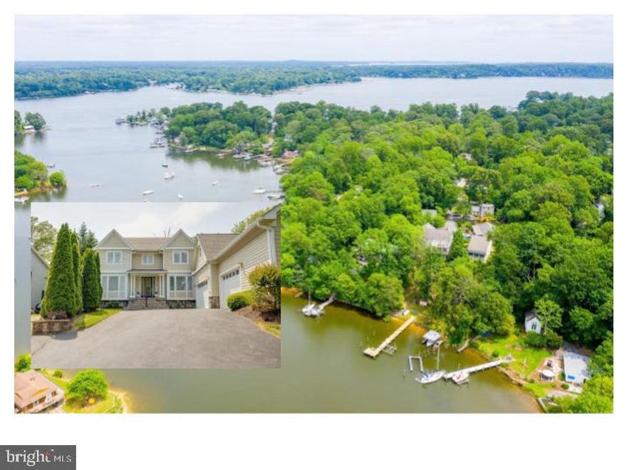 Welcome to this stunning waterfront home overlooking Valentine Creek on the Severn River. This home has a drive through garage which you may enter from behind the home.  Enter into the foyer area you are immediately greeted by the light filled dining with the amazing views beaming through the windows! Kitchen/ Living room area features beautiful & recessed lighting! You will absolutely love the views from this amazing home.  With  doors leading out to the expansive trex deck - perfect for entertaining! Imagine those AMAZING views at sunset! The bright gourmet kitchen boasts granite countertops, center island with a built-in gas stove.  You can even enjoy the incredible views from the main level corner office area while working from home! Main level also boasts gorgeous rich hardwood floors and perfectly placed columns to ensure luxury while not blocking the magnificent view! The spacious master bedroom on the top level features its own private balcony overlooking the water -perfect for enjoying your morning coffee or tea, walk in closet with vaulted ceilings, recessed lighting . The bath features two vanity areas with corian counters, separate soaking tub, shower with glass doors, ceramic tile! Upstairs you will also find three additional light filled bedrooms and washer/dryer. Venture down to the lower level that is an ENTERTAINER'S DREAM featuring a lovely open space with, and another full kitchen.  The views are equally amazing from the lower level with a large patio with columns overlooking the beautiful landscaped backyard and Valentine Creek on the Severn River! Large garage with a drive through and heavy duty car lift, beautiful landscaped backyard and Valentine Creek on the Severn River!  Custom features include, Hardi Plank siding, Hardiplank Shake, House generator, Aprilaire, 1000 gallon propane tank,wireless alarm, propane runs to deck and lower level, closet lights, 75 ft of riparian rights, 100 ft. pier with a 16 x 12 deck and boat lift , 9-10 ft mean low tide, all pella windows, maple cabinets, surround sound on lower level, and much more…   Conveniently located, it’s less than 10 miles or a short boat ride to the restaurants and shopping of downtown historic Annapolis. This private oasis with gorgeous water views is tucked into the woods and conveniently located 30 minutes from both Northeast DC and Baltimore.  Additional 1056 sq ft. above garage that could be used for a in-law apartment. 1300 sq ft of finished lower level,