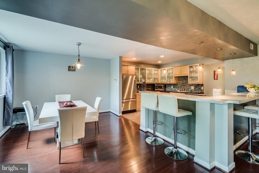 One of a kind, custom interior design, top floor/open floor plan penthouse style condo, bright extra lighting, hardwood throughout, spacious bedrooms and LR/DR, balcony backed to woods view, kitchen completely remodeled, maintenance free and ready to move in now! Minutes to I-95, Old Town Alexandria. Animal Friendly Condo, Dues include: Garbage/water/common ground maint. Location!