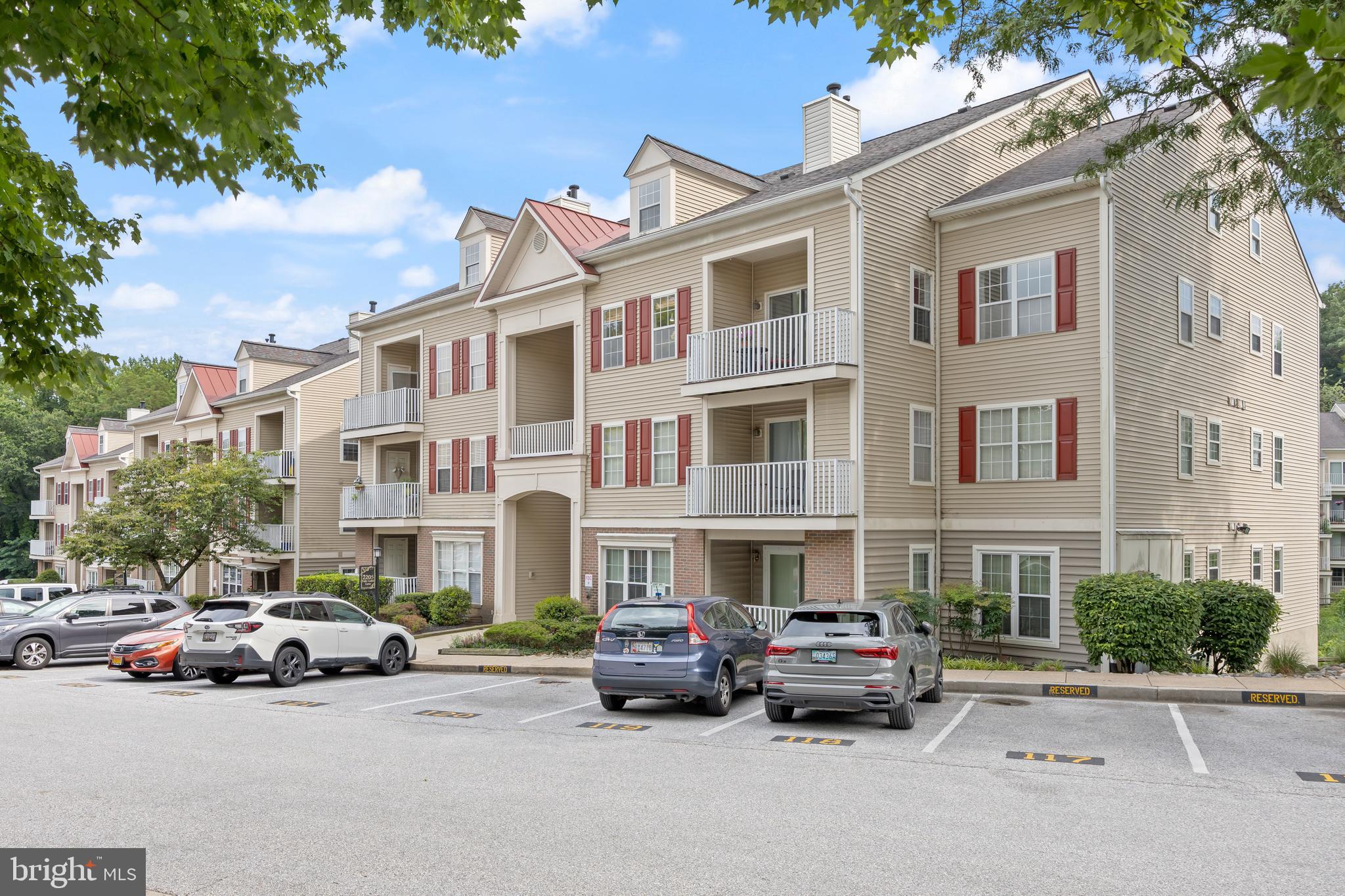 Located in the highly sought-after Falls Gable community, this well maintained 2 Bedroom, 2 Bathroom condo offers an open floor plan with one level living, privacy, and comfort. Both bedrooms offer attached full bathrooms and large walk-in closets for ample storage space. The spacious kitchen features stainless steel appliances, plenty of cabinet space, and a convenient breakfast bar. The kitchen overlooks a separate formal dining room and opens up to a cozy family room, complete with a gas fireplace. Step right outside to a private balcony with peaceful views. —an ideal spot for relaxation. Also featured in the unit is a large laundry room with your own washer and dryer and more storage space, along with a separate pantry for added storage. Enjoy the added perks of living in a community with fantastic amenities, including a community pool, new EV charging stations, and well-maintained grounds. With easy access to I-70, I-83, and I-695, commuting is extremely convenient! Schedule your home tour today! This condo won't last long!