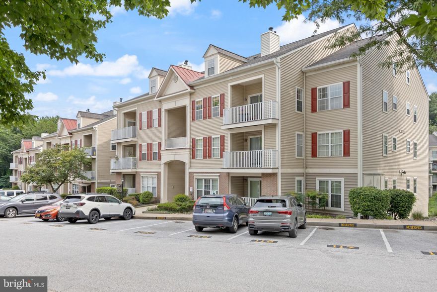 Located in the highly sought-after Falls Gable community, this well maintained 2 Bedroom, 2 Bathroom condo offers an open floor plan with one level living, privacy, and comfort. Both bedrooms offer attached full bathrooms and large walk-in closets for ample storage space. The spacious kitchen features stainless steel appliances, plenty of cabinet space, and a convenient breakfast bar. The kitchen overlooks a separate formal dining room and opens up to a cozy family room, complete with a gas fireplace.  Step right outside to a private balcony with peaceful views. —an ideal spot for relaxation.  Also featured in the unit is a large laundry room with your own washer and dryer and more storage space, along with a separate pantry for added storage.  Enjoy the added perks of living in a community with fantastic amenities, including a community pool, new EV charging stations, and well-maintained grounds. With easy access to I-70, I-83, and I-695, commuting is extremely convenient! Schedule your home tour today! This condo won't last long!