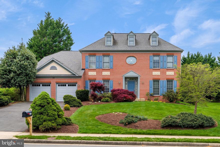 Welcome to 5501 Ashley Road in the sought-after Hampton Forest community, an exceptional brick-front colonial with charming dormers offering over 5,000 square feet of beautifully finished living space designed for both everyday comfort and effortless entertaining.  From the moment you arrive, the home’s curb appeal stands out with professional landscaping, a flagstone walkway, and a warm, inviting presence.  Step inside to a grand two-story foyer with an upper-level balcony, where hardwood floors and fresh neutral paint flow throughout most of the main level, creating a bright, cohesive, and move-in ready feel, flanked by formal living and dining rooms featuring crown molding and floor-to-ceiling windows, ideal for hosting holidays, celebrations, or elegant gatherings.  At the heart of the home, the show-stopping family room impresses with soaring cathedral ceilings, skylights, a striking brick gas fireplace, and ample space for comfortable seating, creating the perfect setting to unwind, relax, and connect.  Just beyond, the chef’s kitchen is both functional and beautiful, featuring white cabinetry, granite countertops, stainless steel appliances including a gas stove, a center island with seating, a built-in desk area, and a butler’s pantry. The adjoining breakfast nook with a bay window offers the perfect spot for casual meals, morning coffee, or gathering with guests while staying connected to the action.  A true highlight of the home is the stunning sunroom, an inviting, light-filled retreat with two walls of windows, French doors opening to the family room and stunning views of the backyard.  Whether used as a reading room, play space, or serene lounge, it’s a rare and cherished extension of the home that enhances everyday living.  The main level also features a private study with custom Mahogany built-ins, ideal for working from home or a quiet escape, along with a conveniently located laundry room just off the garage.  Upstairs, the spacious primary suite offers a true retreat, complete with a custom walk-in closet and a beautifully renovated en-suite bath showcasing on-trend finishes, a large walk-in shower, dual vanities, and a jetted soaking tub, perfect for relaxing at the end of the day.  Three additional bedrooms provide generous space for family or guests, including a renovated Jack-and-Jill bathroom and an additional renovated en-suite, offering comfort and privacy for all.  The lower level expands your living space even further, featuring a large recreation room ideal for movie nights or game days, a bonus room perfect for a guest suite or home gym, a second recreation area with a wet bar for entertaining, and a full bathroom.  Two sizable unfinished storage areas provide excellent flexibility for future customization or organization.  Step outside to a backyard that truly feels like a private retreat. Mature weeping willow and crepe myrtle trees create a picturesque setting, while the expansive deck with gazebo invites outdoor dining, relaxing, or hosting gatherings.  With plenty of flat, usable space, the yard is perfect for play, gardening, or simply enjoying the outdoors.  This home stands out not just for its size and finishes, but for how beautifully its spaces live, offering the perfect balance of open gathering areas and private retreats, making it ideal for both entertaining and everyday life.  Residents of Hampton Forest enjoy a wealth of amenities including pool, tennis courts, basket courts, volleyball courts, playground and walking paths.  Updates include Roof 2019, HVACS 2023 and 2016, Kitchen Reno & Appliances 2022, Premium Wood Blinds 2025, Sunroom Windows (Pella 2022), HW Floors 2017, Gas Fireplace 2022, Garage Doors 2023, Garage Epoxy Floor 2026.  All of this, plus top-rated schools and convenient access to commuter routes, parks, shopping, and dining—making this a truly special opportunity for a move-in ready home in a prime location.