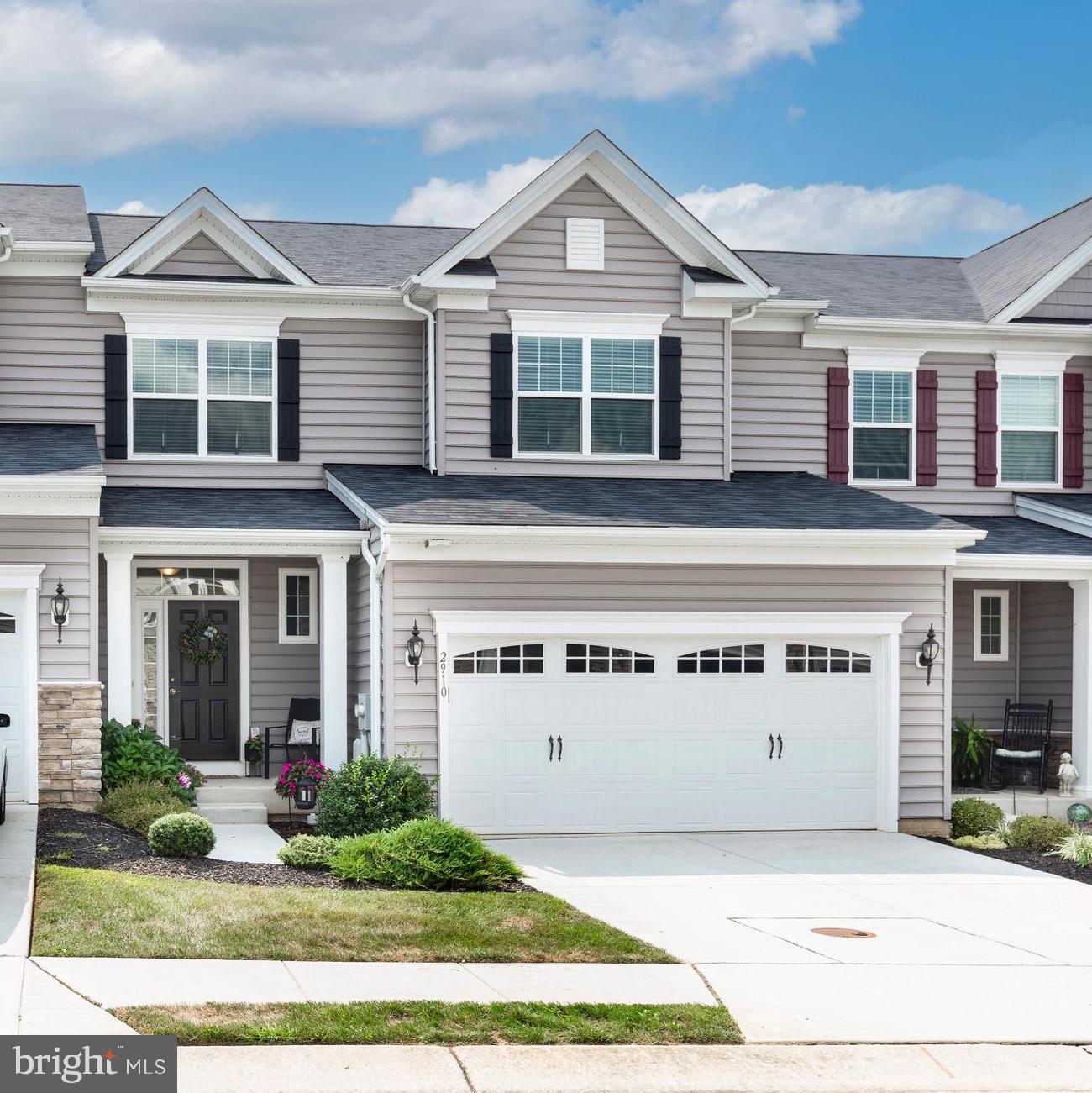 Welcome to The Reserve at New Windsor - a 55+ Active Adult Community! Built in 2019, this beautiful Colonial-style home combines classic charm with modern comfort. The inviting exterior, featuring a cozy front porch and vinyl siding, sets the tone for the thoughtfully designed interior.
Inside you’ll find an open floor plan that seamlessly connects the kitchen, dining, and family room - perfect for entertaining or enjoying everyday living. The kitchen is a chef’s dream, equipped with granite countertops, a center island, pantry, and stainless steel appliances, including a built-in microwave, electric range, and dishwasher. The spacious family room off the kitchen features cathedral ceilings and large windows, offering a bright and cozy space to relax.
This home offers three generously sized bedrooms, including a main-level primary suite. The main level primary bedroom provides a private retreat with a luxurious bath featuring a walk-in shower, double-sink vanity, and a large walk-in closet. Upstairs you’ll find a 2nd family room loft overlooking the lower level, 2 additional bedrooms, a full bath with a private tub/shower-toilet room and a large walk-in storage closet. Additional interior highlights include luxury vinyl plank flooring throughout the main level and plush carpeting upstairs, creating a warm and inviting atmosphere throughout the home. The convenient main-level laundry room makes daily living even easier. The spacious lower level offers endless potential - whether you need extra storage or envision a finished space tailored to your needs. With a full bath rough-in and passive radon pipe already in place and rear exit door providing easy access to the backyard, the possibilities are wide open.
Step outside to enjoy the peaceful backyard from your maintenance free composite deck (added in 2020), overlooking a serene tree-lined backdrop - ideal for morning coffee or evening gatherings. A gutter guard system (installed in 2023) adds ease to exterior maintenance. Parking is a breeze with an attached two-car garage and a spacious driveway.
Enjoy maintenance-free living with lawn care and snow removal included, allowing you more time to embrace the community’s peaceful surroundings and beautiful mountain views. Located just minutes from Westminster, Mt. Airy, and Frederick, you’ll have quick access to shopping, dining, and rich historical sites. The community is also just 10 minutes from McDaniel College and Carroll Community College, offering educational and recreational opportunities. Westminster’s charming downtown is home to the Carroll Arts Center, which hosts live music, art exhibitions, film, and theater events - providing plenty of entertainment close to home.
This home is more than just a place to live - it's a lifestyle focused on comfort, convenience, and community. Don’t miss your chance to make it yours!