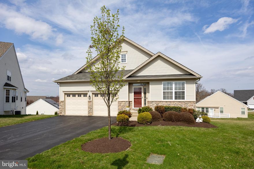 Welcome to 45 Ackman Lane, a beautifully maintained single home located on a quiet cut de sac  in the highly sought-after Villages at Hillview, offering easy one-floor living and exceptional resort-style amenities. This thoughtfully designed 2-bedroom, 2-bath home features a spacious and functional layout with beautifully connected living spaces that are ideal for both everyday comfort and effortless entertaining. A welcoming office/den greets you upon entry, while the open-concept living and dining room provides an ideal setting for gatherings. The heart of the home is the expansive kitchen, complete with granite countertops, abundant cabinetry, and generous prep space, all flowing seamlessly into the inviting family room with a cozy gas fireplace. From here, step outside to the expanded Trex deck, perfect for enjoying morning coffee, outdoor dining, or peaceful evenings at home. The spacious primary suite offers a relaxing retreat with a large en suite bath and walk-in closets outfitted with organizers. A well-sized second bedroom and full hall bath provide flexibility for guests or additional living space. A convenient laundry room with direct access to the 2-car garage adds everyday ease and functionality. Additional features include a walk-out basement with endless potential for storage, workshop space, or future finished living area, custom window treatments throughout, newer HVAC, and a brand new water heater.   Enjoy all that the vibrant Villages at Hillview community has to offer, including pools, tennis and pickleball courts, a fitness center, clubhouse, and a variety of clubs and social activities. This is a wonderful opportunity to enjoy low-maintenance living in one of the area’s most popular active adult communities. One year home warranty included with purchase.