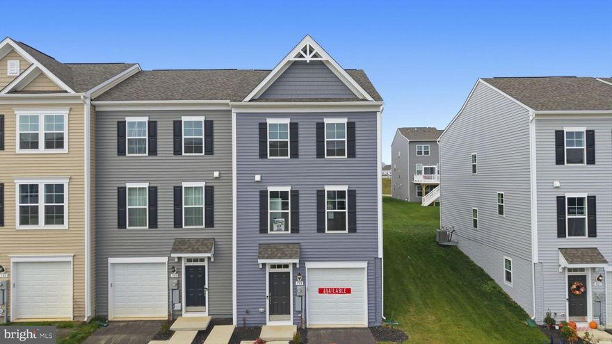 **Pending release of current contract**
** Up to $15,000 CLOSING COST ASSISTANCE AVAILABLE, FOR PRIMARY RESIDENCE WITH USE OF APPROVED LENDER AND TITLE!*
The only community within historic Charles Town with resort style amenities! Brand New Construction Available in Jefferson County’s premier planned community. This 3 Bedroom, 3.5 Bath, 1 car garage end unit townhome features an open concept oversized kitchen with a large island and opens to the morning room and living room. This home features our Alternate Main Floor Option, which truly creates an open concept from the front of the home to the back. The primary suite features a large walk-in closet, dual vanity, soaking tub and separate shower. Laundry is located on the bedroom level. The home is complete with a finished basement and a full bathroom.