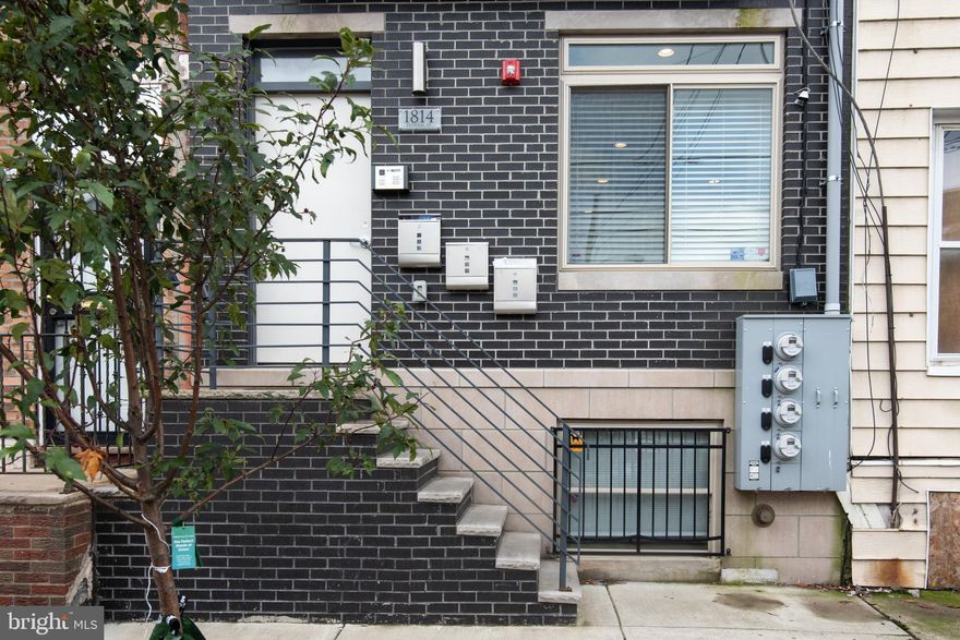 Stunning bi-level condo in Point Breeze...just down the street from The Sardine Bar, top rated Philly restaurant. Home boasts hardwood flooring thru-out, top notch finishes in kitchen & baths, built-ins, custom closets & window treatments. Newer high end fridge & washer/ dryer. Custom entry way built ins for smart storage to maximize space. Main bedroom custom closet with valet bars, jewelry drawers, etc. Lower level private room perfect for home gym or home office. Patio off the lower level. Hard wired for high speed internet. Wired for home security, cameras mounted outside, motion sensor lights outside, all security features within the house, too. Upgraded doorbell system with remote access (buzz in UPS from your phone when you're not home!). Located less than 1 mile from Rittenhouse Square, this home is walking distance to Sprouts, Passyunk, and all the cultural icons that Center City living has to offer. ALSO FOR SALE