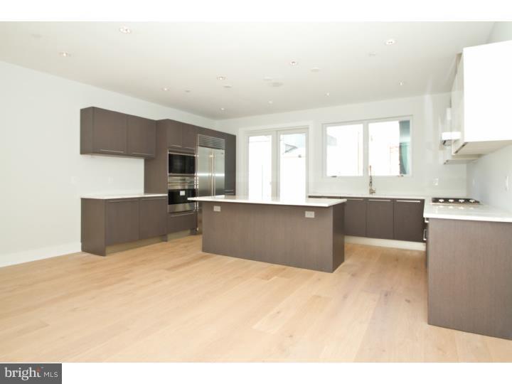 Introducing Parke Place TownHomes! Stunning NEW Construction homes with ELEVATORS, 2-CAR Garage, 5 outdoor spaces and 4000 square feet of living space! This south facing home boasts 4 bedrooms, 4.5 bathrooms and a 7-stop elevator. Hardwood flooring throughout, 15ft ceilings in living room, 12ft ceilings in lower level den, 8ft doors throughout, amazing natural light. Gorgeous European kitchen boasts cabinets imported from Spain, Wolf, Subzero, Miele and Viking appliances, stone countertops. Living room has fireplace and wall built ins, amazing city views, green roofs, 10 year tax abatement, finished basement with radiant floor... the list doesn't end! This stunning home is in the heart of Center City! Special Financing available for Parke Place Buyers!! Details available upon request! 80/10/10 loans available and 90% Physicians loans available as well!!