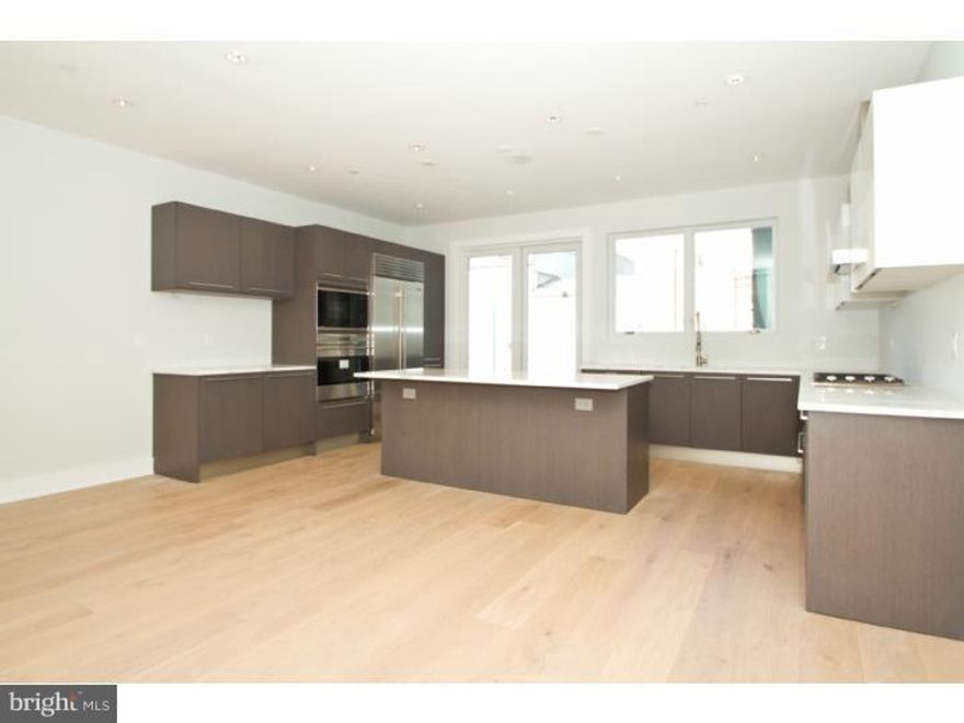 Introducing Parke Place TownHomes! Stunning NEW Construction homes with ELEVATORS, 2-CAR Garage, 5 outdoor spaces and 4000 square feet of living space! This south facing home boasts 4 bedrooms, 4.5 bathrooms and a 7-stop elevator. Hardwood flooring throughout, 15ft ceilings in living room, 12ft ceilings in lower level den, 8ft doors throughout, amazing natural light. Gorgeous European kitchen boasts cabinets imported from Spain, Wolf, Subzero, Miele and Viking appliances, stone countertops. Living room has fireplace and wall built ins, amazing city views, green roofs, 10 year tax abatement, finished basement with radiant floor... the list doesn't end! This stunning home is in the heart of Center City!  Special Financing available for Parke Place Buyers!! Details available upon request! 80/10/10 loans available and 90% Physicians loans available as well!!