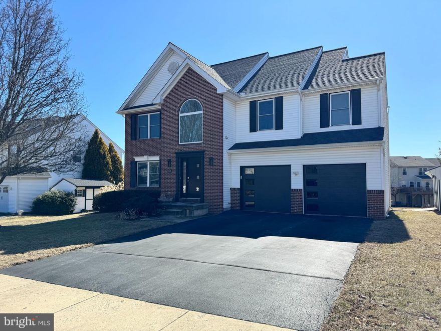 *Deadline for offers is Sunday 4/6/2025 at 9 PM**
Welcome to 315 Minuteman Drive, a brick-front beauty nestled in the sought-after community of The Colony in Upper Providence Township. This 4-bedroom, 2.5-bath home offers a spacious and functional layout with modern updates, making it move-in ready for its next owner.

Step inside an inviting, open-concept design. Hardwood floors flow through the living and dining areas, creating a warm and elegant atmosphere. At the heart of the home, the sun-drenched kitchen features ample cabinetry, plenty of counter space, and a seamless connection to the family room, complete with a charming wood fireplace, perfect for cozy nights.

The turned staircase leads to a well-appointed primary suite featuring two closets and an ensuite bath with a jacuzzi tub and separate shower. Three generously sized bedrooms and a convenient second-floor laundry room complete the upper level, offering comfort and practicality.

The finished basement expands the living space, providing a versatile entertainment area, a small office, abundant storage, and additional flex space—ideal for a home gym, playroom, or future bar setup.

The exterior is just as impressive, boasting brand-new black-capped windows, a modern garage door with openers, and a newer shingled roof. A spacious backyard provides the perfect setting for outdoor relaxation or entertaining.

Located in the award-winning Spring-Ford School District and just minutes from major routes, shopping, dining, and recreation, this home offers the perfect blend of convenience and community living.

Don't miss this opportunity—schedule your private tour today!