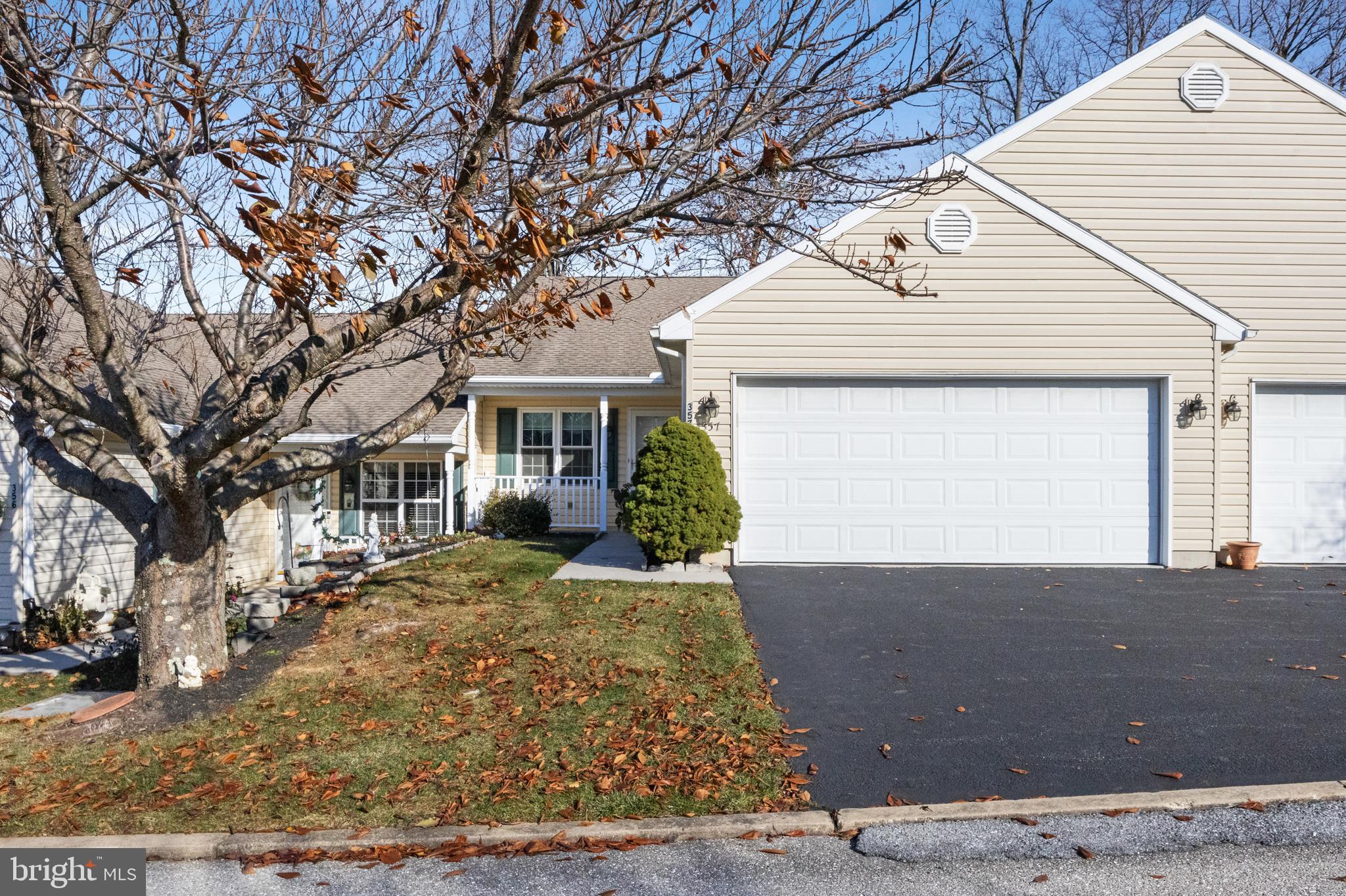 ENJOY THE EASY LIFE with one level living in an established condo community located close to all amenities. Equine Meadows is a 55+ community that offers great amenities. Swim all year in the in-door community swimming pool. This comfortable 2 bedroom, 2 bath home features two living areas, a dining room, generous sized kitchen with abundant counter space, cabinets and a pantry. A full complement of appliances is included. A small covered front porch as well as a rear patio provide opportunity for outside enjoyment. Park in the two car garage and never worry about clearing your car or shoveling snow again!