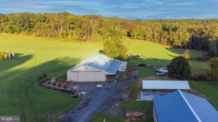 Great location in Clarksburg 66 +/- Acre Farm with 2 Buildings one building has 8 stalls and washroom, another building is for storage with lean-to and 5 additional stalls. There is Water and Electric in both buildings. The Property is Fenced and Backs to Little Bennett Park for more trail riding. House is not liveable, it needs updating. parcel #1 ID -44.35a 160200023262- Parcels#2- ID 18.62 a 160200023251
