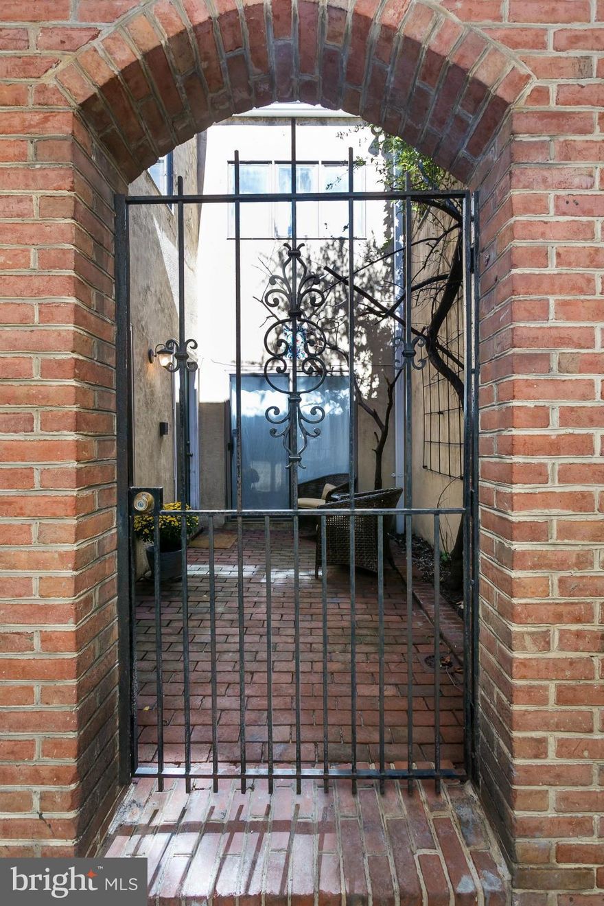 Fantastic Federal Hill home on a quiet street. Rare 2 CAR COVERED PARKING in heart of the city.  Enjoy a private deck on lovely nights & warm up to a wood burning fireplace in the winter.  Wonderful neighbors that host block parties. Near inner harbor attractions. Gourmet kitchen w/ stainless steel appl.  2 storage units.  Updated master bath w/ double vanities. Great open floor plan. A MUST SEE!