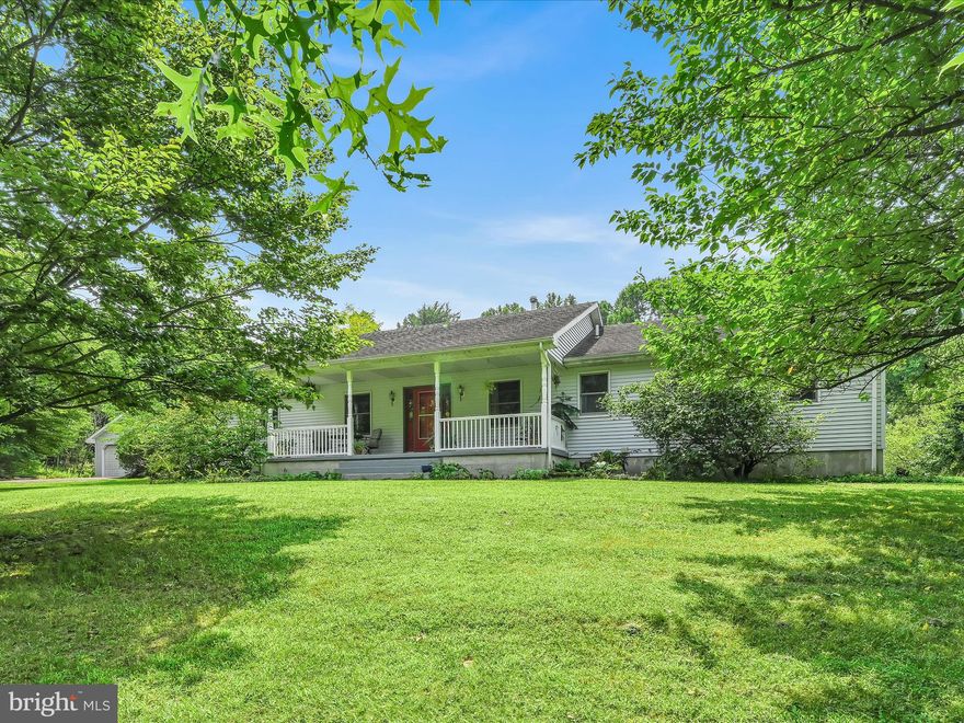 Here is your chance to own your  own slice of heaven on earth! This well maintained ranch home is located in a private rural setting and sits on 4 acres. This home was built and loved by the current owners. It features 4 bedrooms and 2 1/2 baths. The open floor plan lends itself to great family gatherings and entertaining guests.  The spacious kitchen comes with leathered granite countertops, a large pantry, and a island to help make meal prep a breeze. The living room is a great place to relax after a long day and enjoy the warmth of the wood stove in the upcoming cooler months. Check out the 4 season sun room, perfect for the green thumb in the family. It's also a great place to relax with a book while listing to the sounds of the garden water feature. It features a tile floor and beautiful tongue and groove wood ceiling.  You'll love the gorgeous hardwood floors that adorn the large family room.  Down the hall you'll find a full bath, that has a double vanity and great storage options. This home has 3 bedrooms on one side of the home with the option for a 4th on the other side.  There is also potential for a 5th bedroom in the basement. A laundry area and a powder room are also located on the main floor for added convenience. You'll also find a finished basement area. Perfect for a rec room, movie room, or workout area. There is an additional full bath here as well and finished space for another bedroom or a home office. This home has much to offer outside as well.  You can homestead here with ease! Established gardens, fruit trees, a chicken coop, and more. Great hunting as well with game lands nearby. Sale subject to final subdivision completion. Don't miss a change to make this house your home! Call today for a private showing!