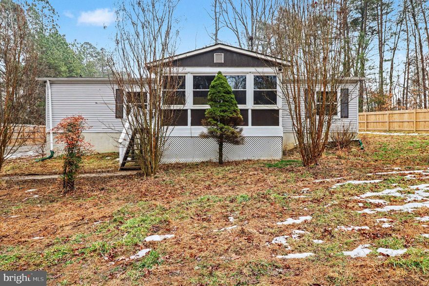 Turn this EXCEPTIONAL PROPERTY into the home that you have always wanted. This home will truly be the perfect blend of PRIVACY, functionality, and peaceful country living. Situated on FIVE beautiful ACRES, this one-level home features 3 bedrooms and 2 baths, FULLY FENCED 6-8 foot privacy fencing with gated access, REGULATION BASKETBALL COURT --- A private paved driveway leads to the gate, creating a secluded setting with plenty of space for animals and hobbies --- NO HOA --- The property also includes a detached two-car garage complete with a private unfinished studio apt with plumbing for kitchenette and a full bathroom. MULTIGENERATIONAL living, guests being able to have a private space or the perfect OPPORTUNITY for RENTAL INCOME. --- Conveniently located within easy driving distance to Fredericksburg and Lake Anna, this home combines RURAL TRANQUILITY with nearby amenities. Updates include kitchen and bathrooms 2024, HVAC in 2020, a 30-year roof installed in 2010, and a whole house Generac generator that conveys. Make this property shine for you and your family.