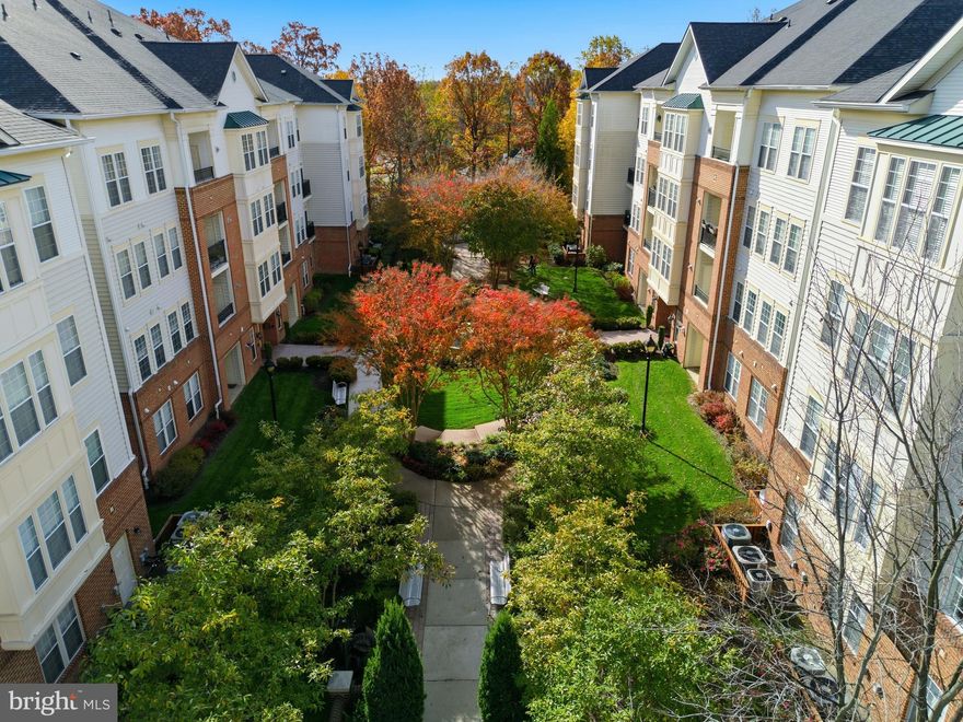 Welcome to this beautiful and luxurious 55+ community in Ellicott City! This sought-after third-floor corner elevator condo with two bedrooms and 2 full bathrooms is drenched in sunlight and has so many desirable features to offer! This home boasts Fresh Paint & New Carpet. The inviting living room provides an amazing place to relax or entertain guests with so much natural light! It features carpeted flooring and a charming sunroom that is PERFECT for plants to thrive. Next to the living area, you will find a beautiful dining room or den area making it the perfect place to enjoy your favorite meal or entertain guests. This room seamlessly flows into the kitchen, creating a perfect flow for entertaining and everyday living. The kitchen itself is well-equipped with good counter space including a kitchen island, an open layout, Stainless Steel Appliances, and 42" Wood Cabinets making it a joy to prepare meals. The recessed lighting provides a bright and welcoming ambiance, while the wood cabinets offer both functionality and style. The kitchen opens up to a second living area providing more space and creating a comfortable kitchen/living area. The primary bedroom is a true retreat with its comfortable carpeting, ceiling fan, and an attached bathroom. It also features a walk-in closet, providing plenty of storage space. The primary bathroom offers great counter space and a tiled shower, perfect for unwinding after a long day. The second bedroom is equally inviting, featuring carpeting, a ceiling fan, and large windows that let in plenty of natural light. It's a cozy space with great functionality. The second full bathroom is handicap accessible, ensuring convenience for all. The condo includes a spacious laundry room equipped with an upgraded washer and dryer, making laundry chores a breeze. Additionally, this community offers a beautiful outdoor space, perfect for relaxing and socializing. You'll also enjoy access to desirable amenities, such as a fitness center , community center, and tennis courts. The residents of this community embrace the concept of doing life well together with a full calendar of regularly scheduled social and learning events throughout the year. The location of this community is truly remarkable, with convenient access to shopping, restaurants, parks, and trails. Route 29 and Interstate 70 are easily accessible, as well. Don't miss the opportunity to make this beautiful 55+ condo in Ellicott City your new home. Experience the comfort, convenience, and wonderful community lifestyle it offers. Schedule a showing today and seize this amazing opportunity!