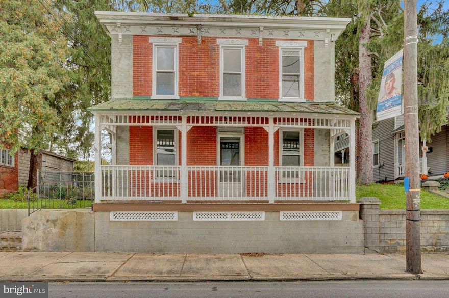 Welcome to 26 W. Penn Ave. in Wernersville. Come check out this brick two-story with full attic and full basement. Totally remodeled in 2023, replacement windows, new rubber roof on the back addition, new porch floor and railings, new kitchen with granite countertops, new powder room. Everything updated & newly painted brand, new electric heat pump and central air, tile shower, Luxury vinyl plank floors on the first floor and wall-to-wall carpet on the second floor, which includes second floor laundry. Outside you'll find a spacious lot with fenced in area for pets, updated landscaping, covered rear patio and a detached, two bay garage workshop with second floor storage. Theres plenty of off street parking affordable single detached dwelling  in Conrad Weiser schools, it's a must see.