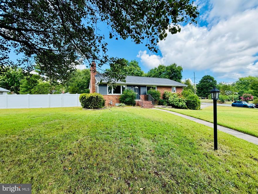 This beautiful and cozy Mid Century Ranch style home is located on a fully fenced private corner lot in a strategic area of Alexandria, moments away from parks, I-395, shops, restaurants and major intersections.  The main level includes 3 bedrooms and two full bathrooms, hardwood floors and a decorative fireplace in the living room.  Kitchen with quartz carrara marci countertops includes finger print resistant SS counter depth bottom freezer fridge and dishwasher, SS electric range, over the range microwave, dishwasher, under mount sink, & pull down single handle faucet.  Fully finished lower level includes a recently renovated den, full bathroom, laundry room with top load washer and electric dryer  and rec room with ample storage space.  Attached one car garage with workbench and driveway for convenient off street parking.  Pets case by case