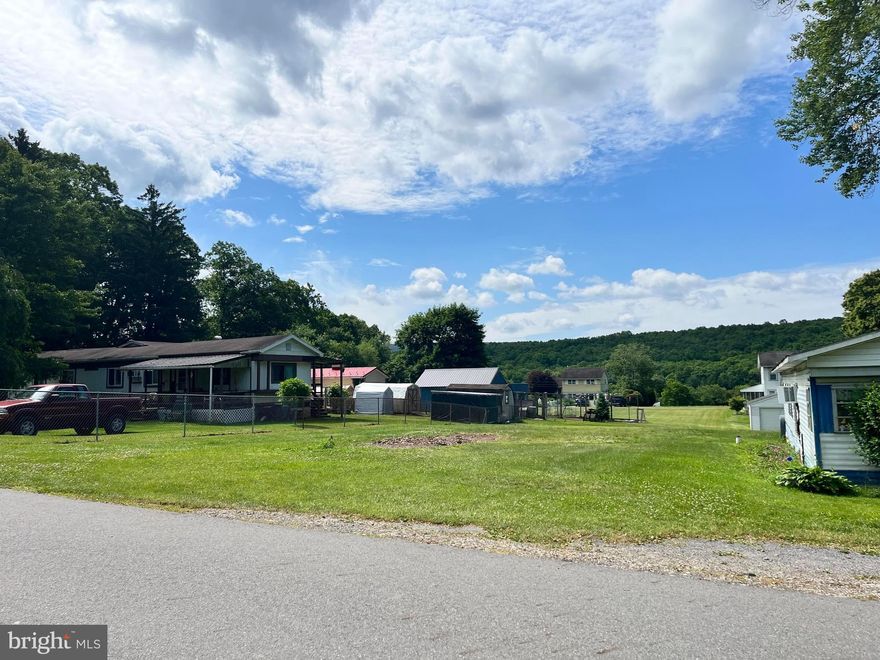Level and cleared lot for sale in Tower City, the work is done for you. The lot previously had a structure on it, public water and sewer available. On a quiet back road, you have a peaceful view of the mountains!
