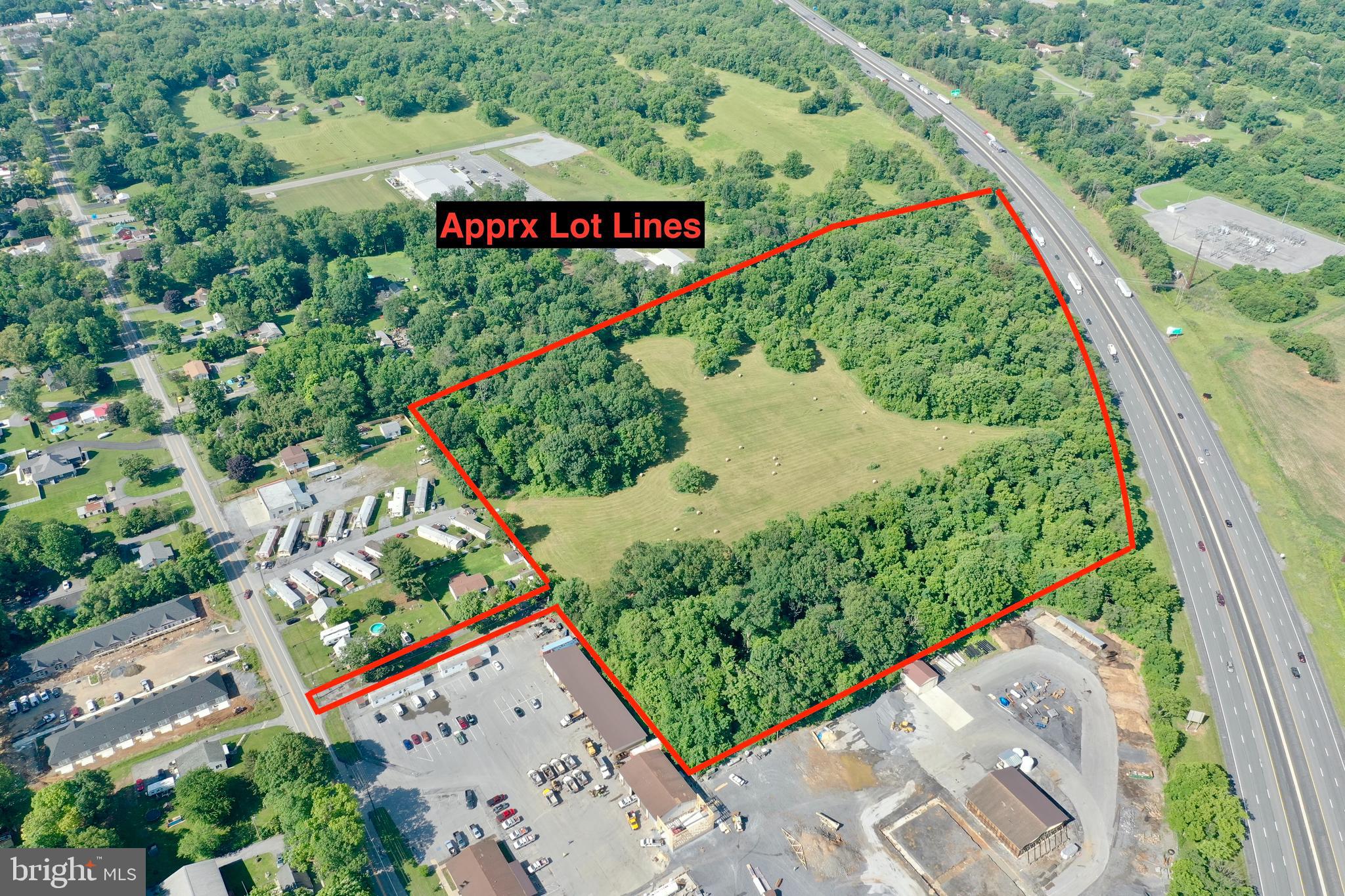 Just minutes to I-81 is this 22+ acres of prime real estate ready for either commercial, residential or industrial development. Flat and accessible. Out of the city limits with no Zoning Restrictions.