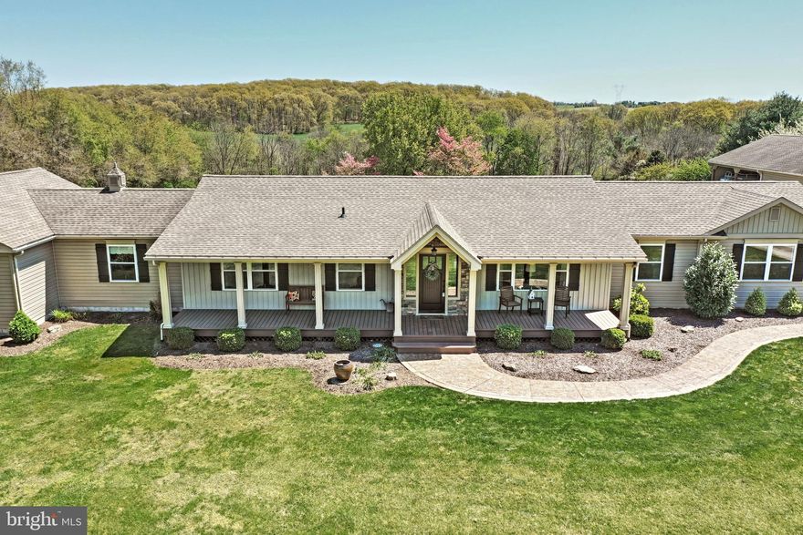 Pulling up the private drive you'll first see the inviting front porch of this beautifully updated rancher. Desirably located in Adams county, Littlestown School District, the home sits perfectly on 4.65 acres in a rural setting with room to grow. Conveniently located for commuters and local shopping. Property offers a 30'x74' detached garage (built 2013) including 3 bays and 2 carport spaces. It's the perfect place for all your toys or hobbies! This home offers 4 large bedrooms, 3 full baths, and an attached garage. The master (added 2012) is very large with a large full bath and walk-in closet. The family room is oversized for all those friend and family gatherings. Off the back of the house through the patio door is the brand new deck perfect for all your entertaining needs. The view from the back is gorgeous! A large, well maintained yard with rural views all around.  Full unfinished basement with lots of storage. Furnace and a/c unit are <5 years old.  All new windows, new kitchen appliances,  new roof. Don't miss your chance to call this home!